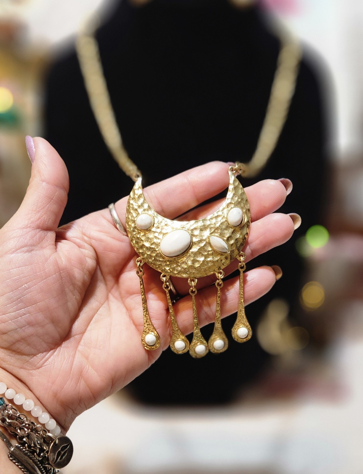 Vintage gold-toned necklace Crescent moon pendant with a hammered finish.