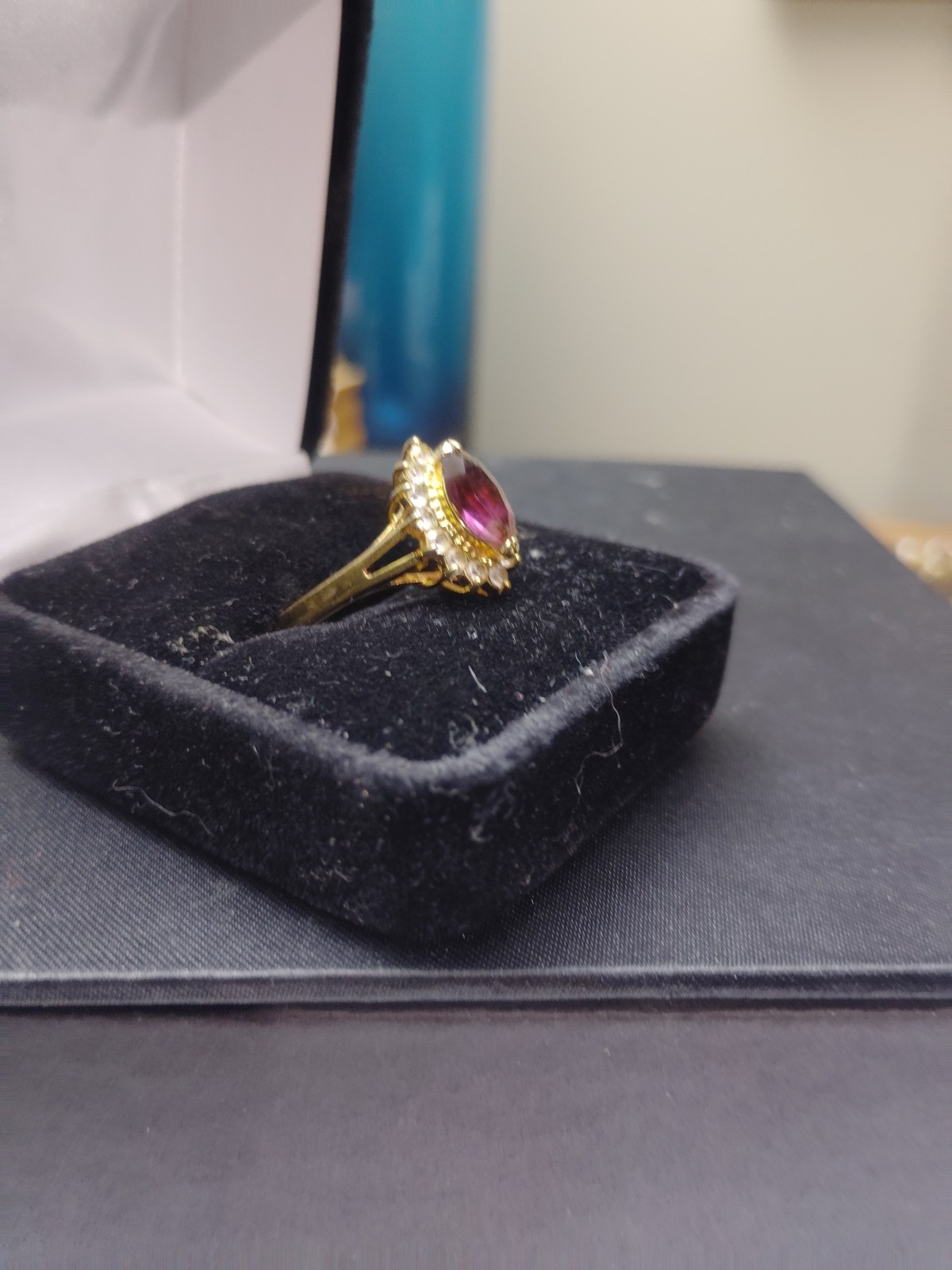 Vintage Amethyst Ring Set On An 18k Gold Band With White Saphire Accent Stones