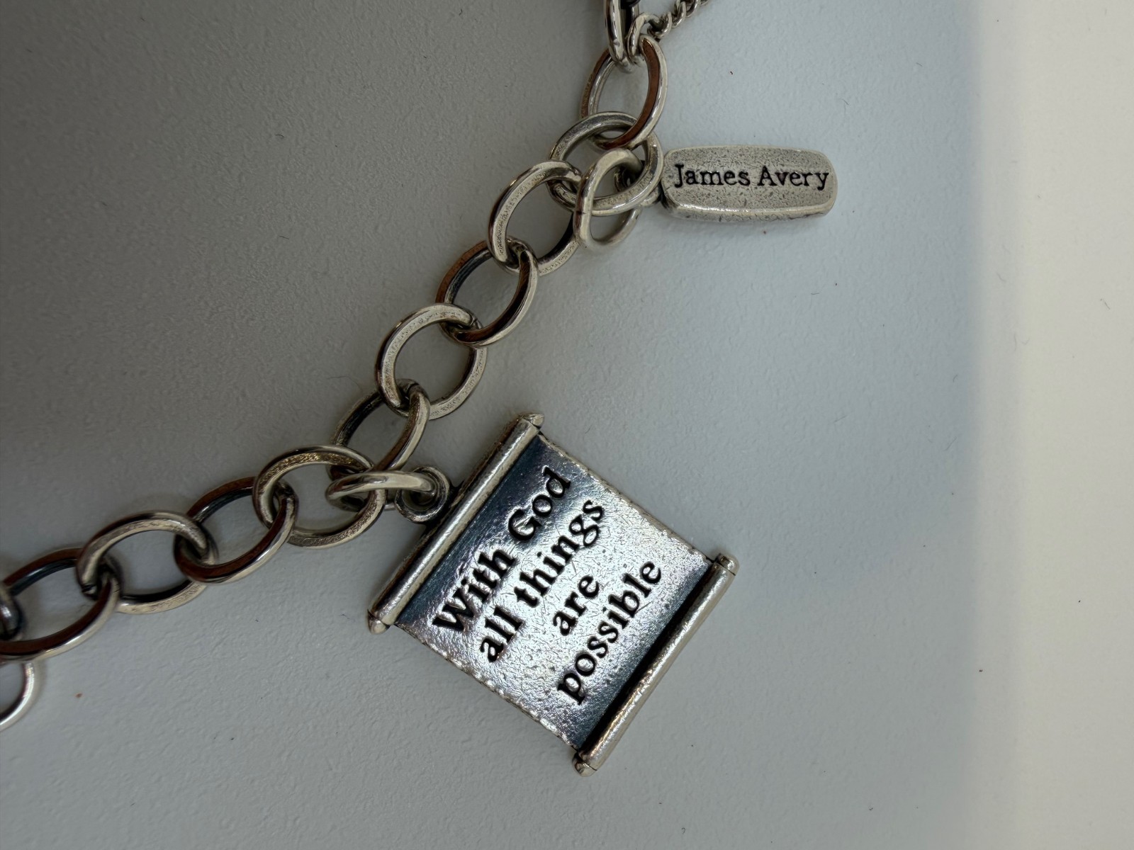 James Avery Sterling silver Charm bracelet with 6 Charms 7.5 Inch. 18+ Grams.