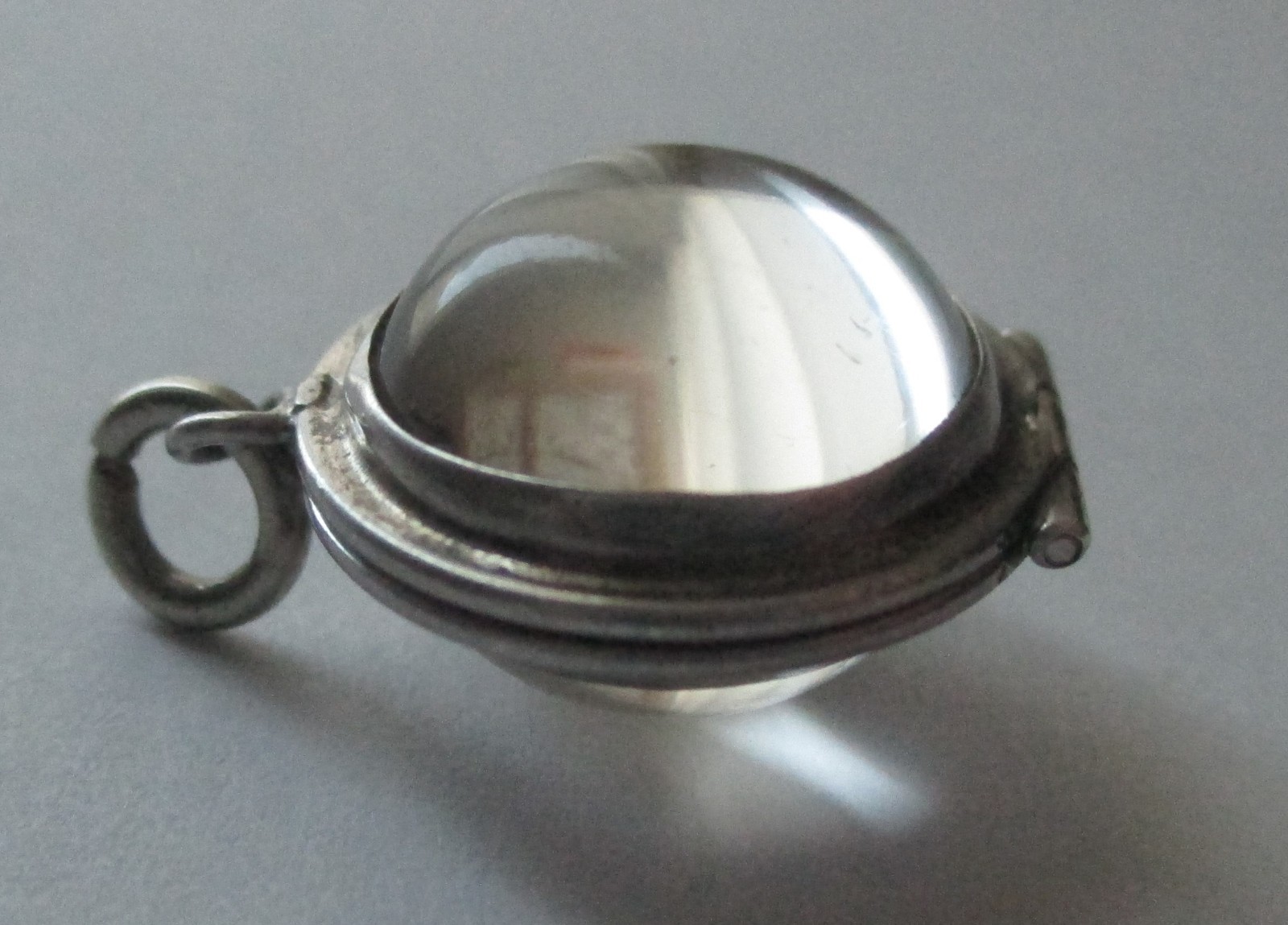 3/4in SMALL VINTAGE STERLING SILVER GLASS ORB LOCKET CHARM POOLS OF LIGHT STYLE