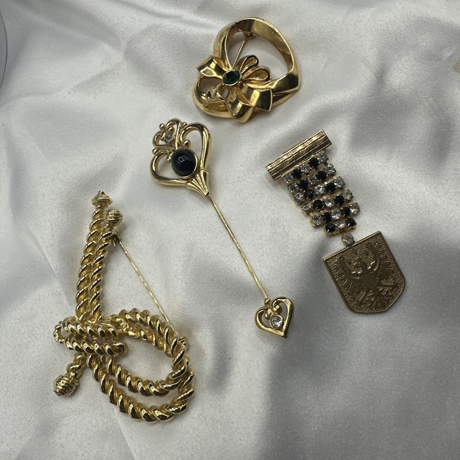 Three Mixed Vtg Gold Toned Brooches and One Pon.See pics.