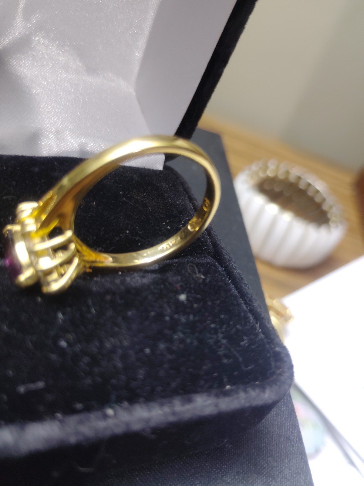 Vintage Amethyst Ring Set On An 18k Gold Band With White Saphire Accent Stones