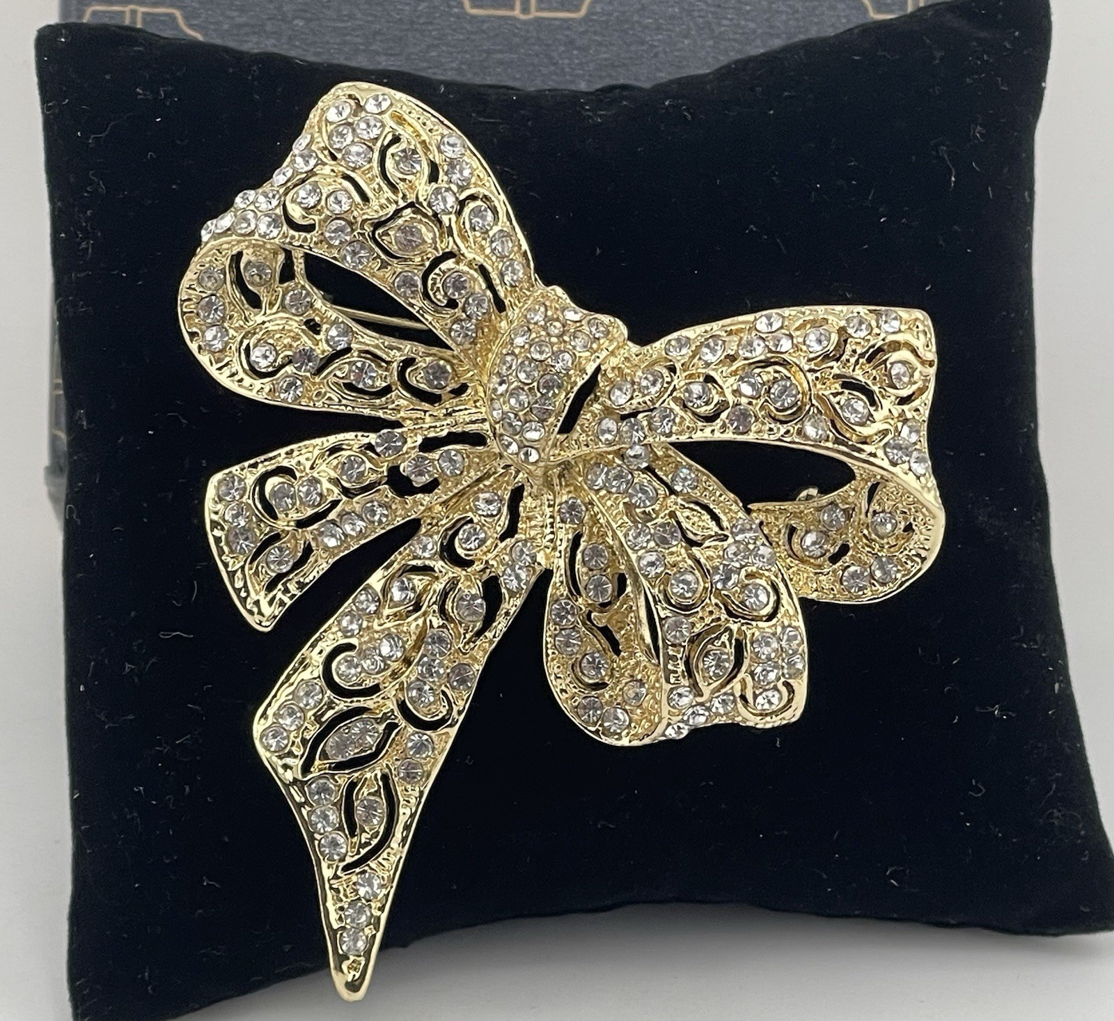 Vintage Monet Gold-Tone Rhinestone Bow Brooch -Statement Pavé Crystal Ribbon Pin