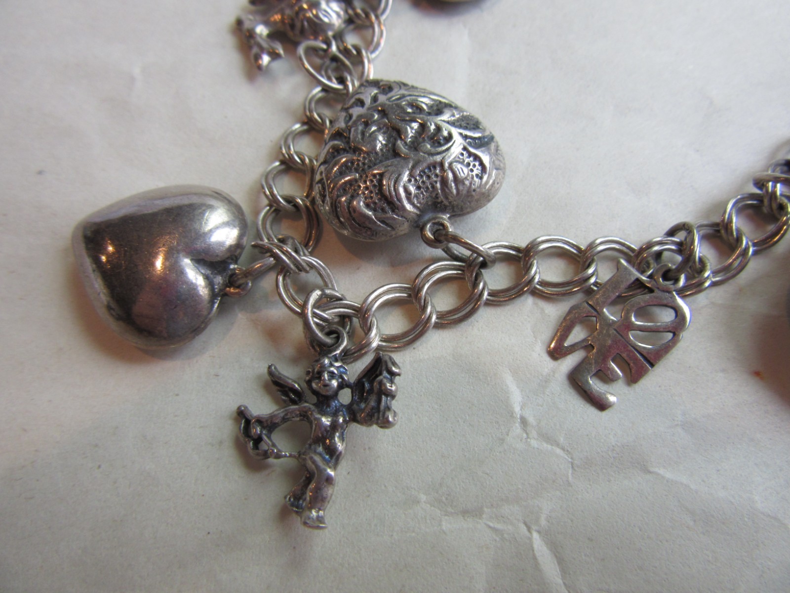 Vintage double link chain necklace with 22 heart, love themed charms 61.8 grams