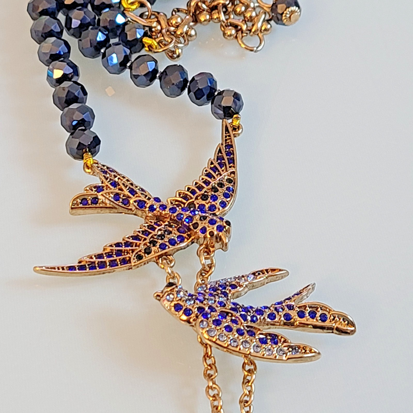 Signed Lihangyuan Twin Flying Birds Necklace Blue Rhinestone Black Bead 5″ Drop