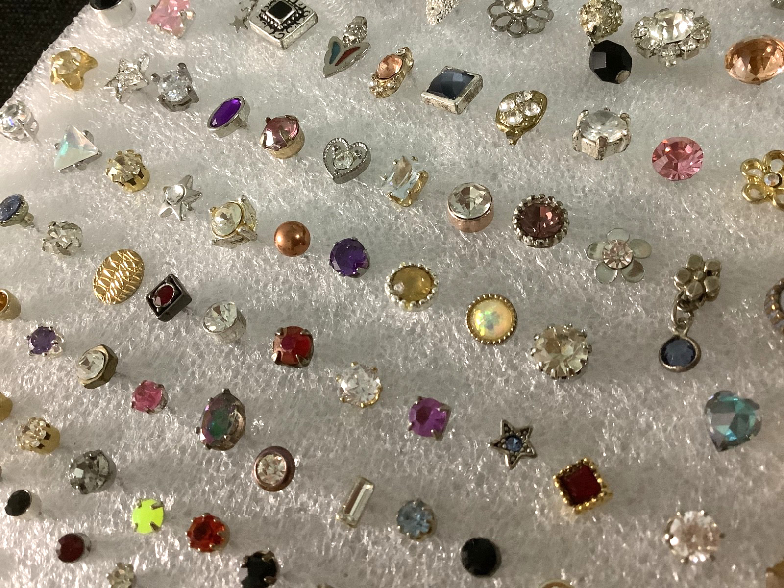 Huge lot of mixed vintage SINGLE stud earrings various unknown stones materials