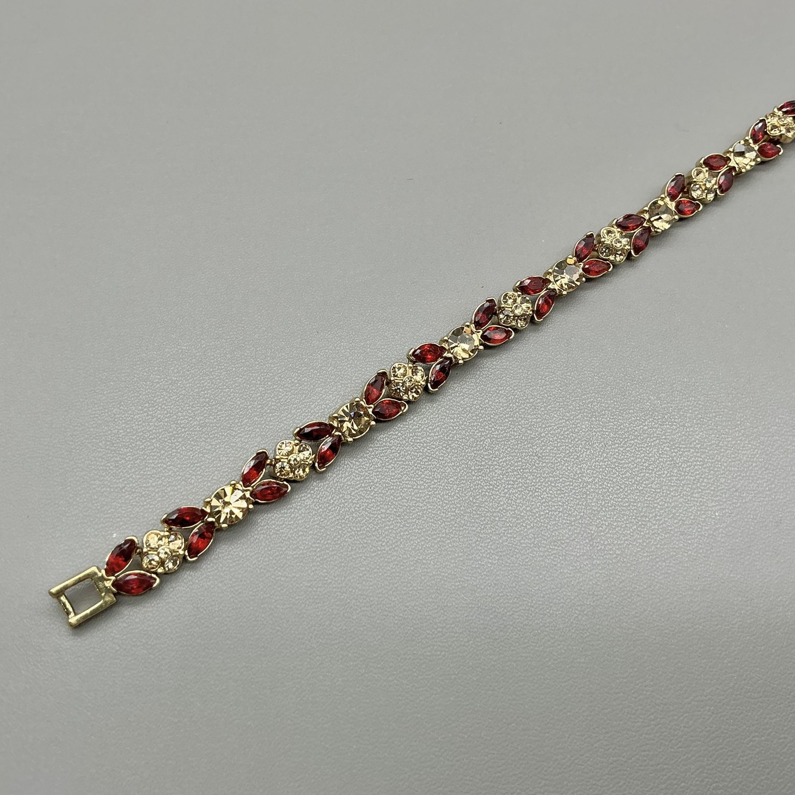 Vintage Monet Bracelet Red Clear Rhinestone Tennis Gold Tone Womens Jewelry