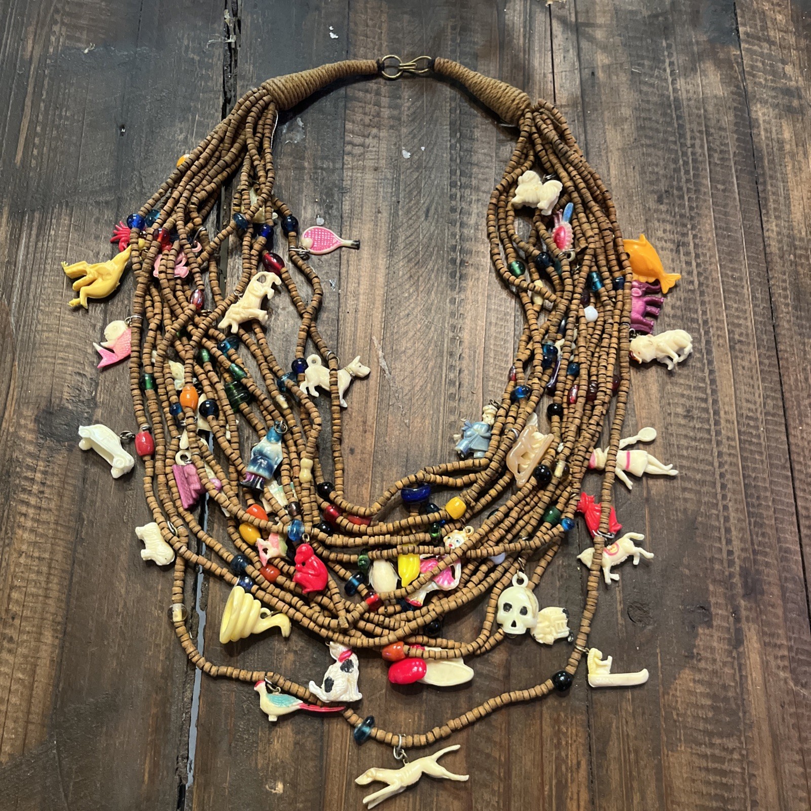 Vintage one of a kind wood bead Necklace w/ tons of celluloid charms unique cool