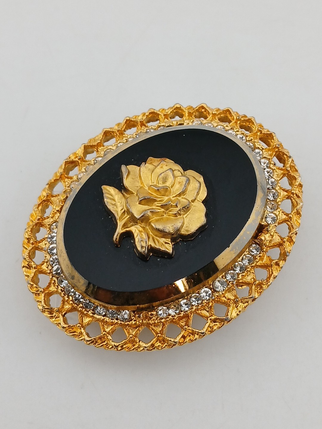 Signed CELEBRITY gold tone black glass clear stones rose cameo pendant brooch