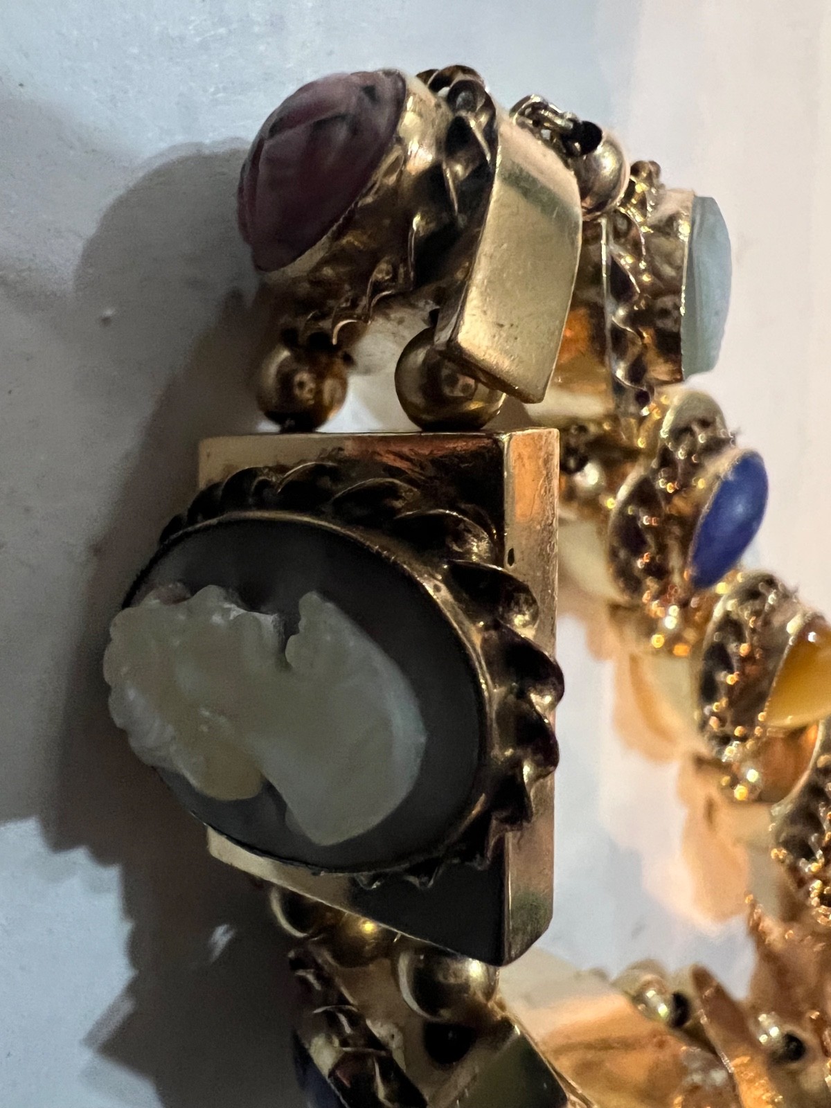 14k Gold ANTIQUE VICTORIAN GOLD CHARMS SLIDE BRACELET. CIRCA (1837-1901)