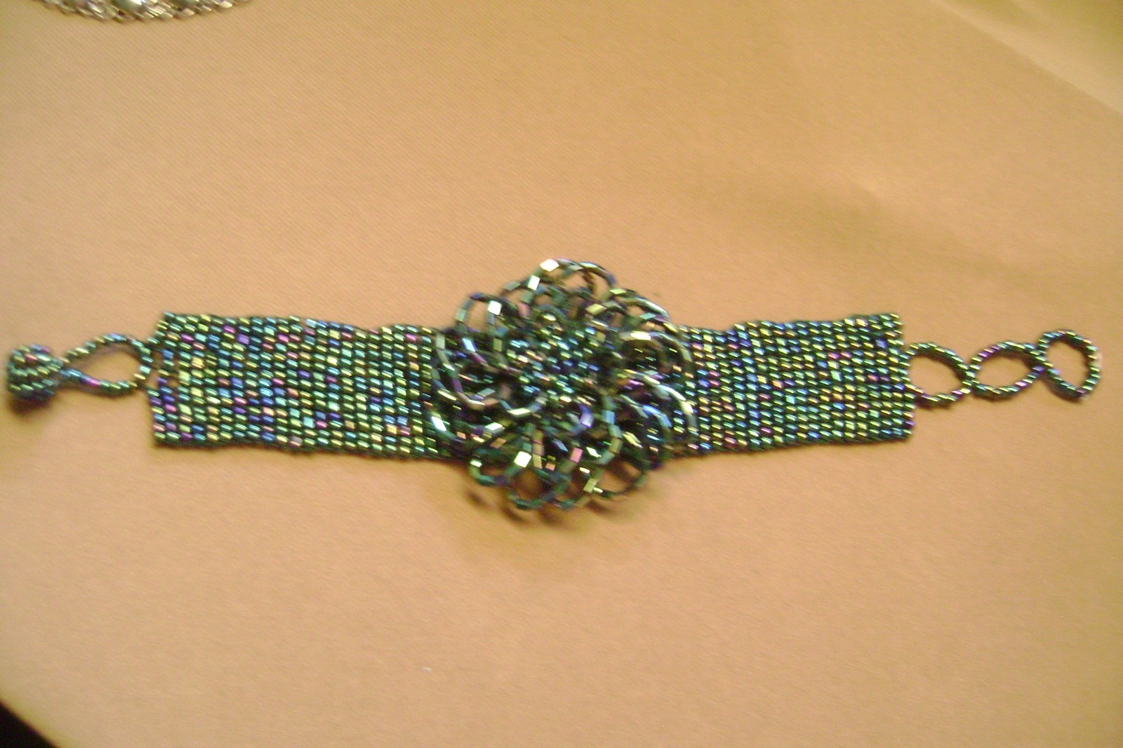 VTG- WIDE MULTICOLOR GLASS SEED BEADED LARGE CENTER FLOWER ADJUSTABLE BRACELET