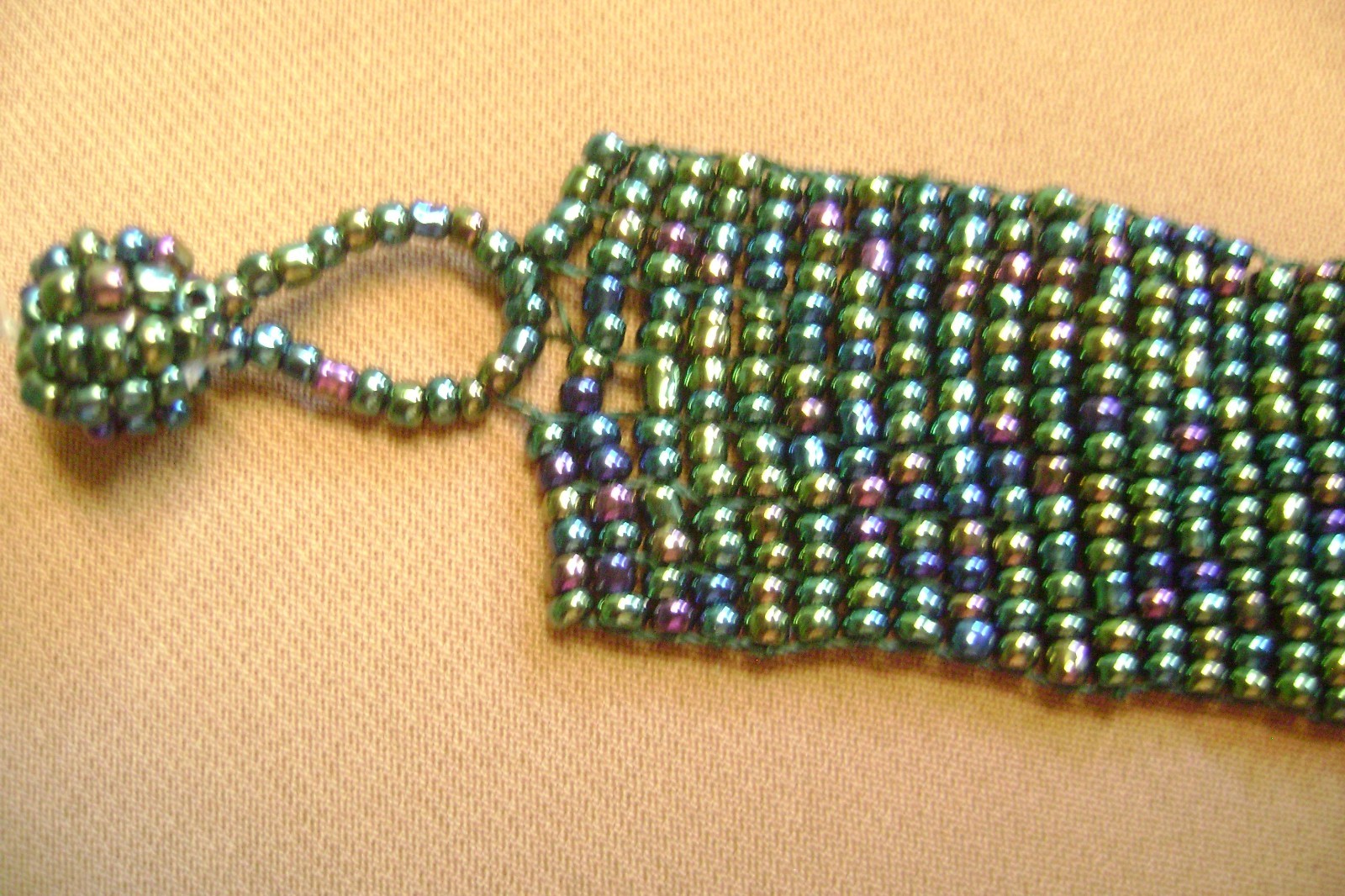 VTG- WIDE MULTICOLOR GLASS SEED BEADED LARGE CENTER FLOWER ADJUSTABLE BRACELET