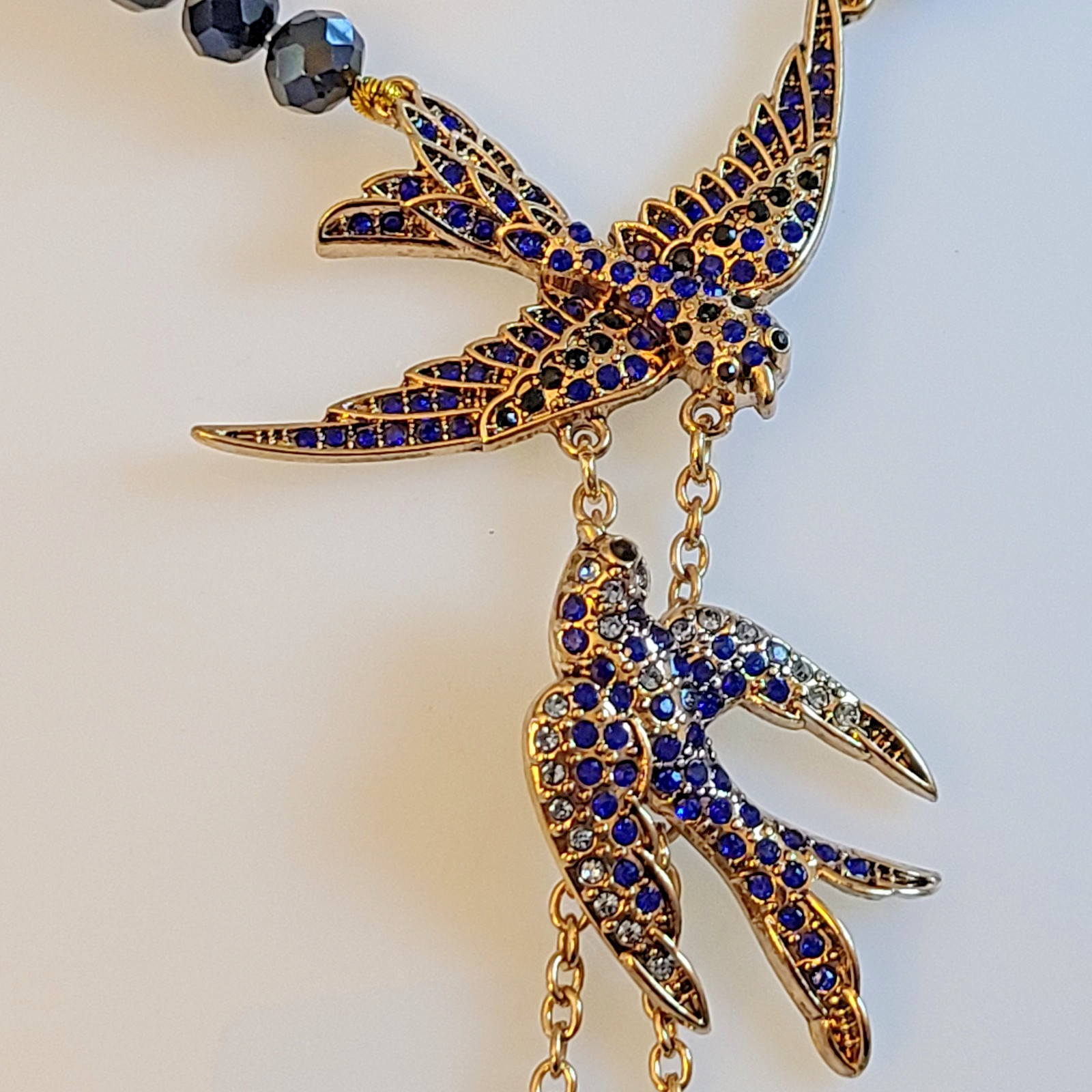 Signed Lihangyuan Twin Flying Birds Necklace Blue Rhinestone Black Bead 5″ Drop