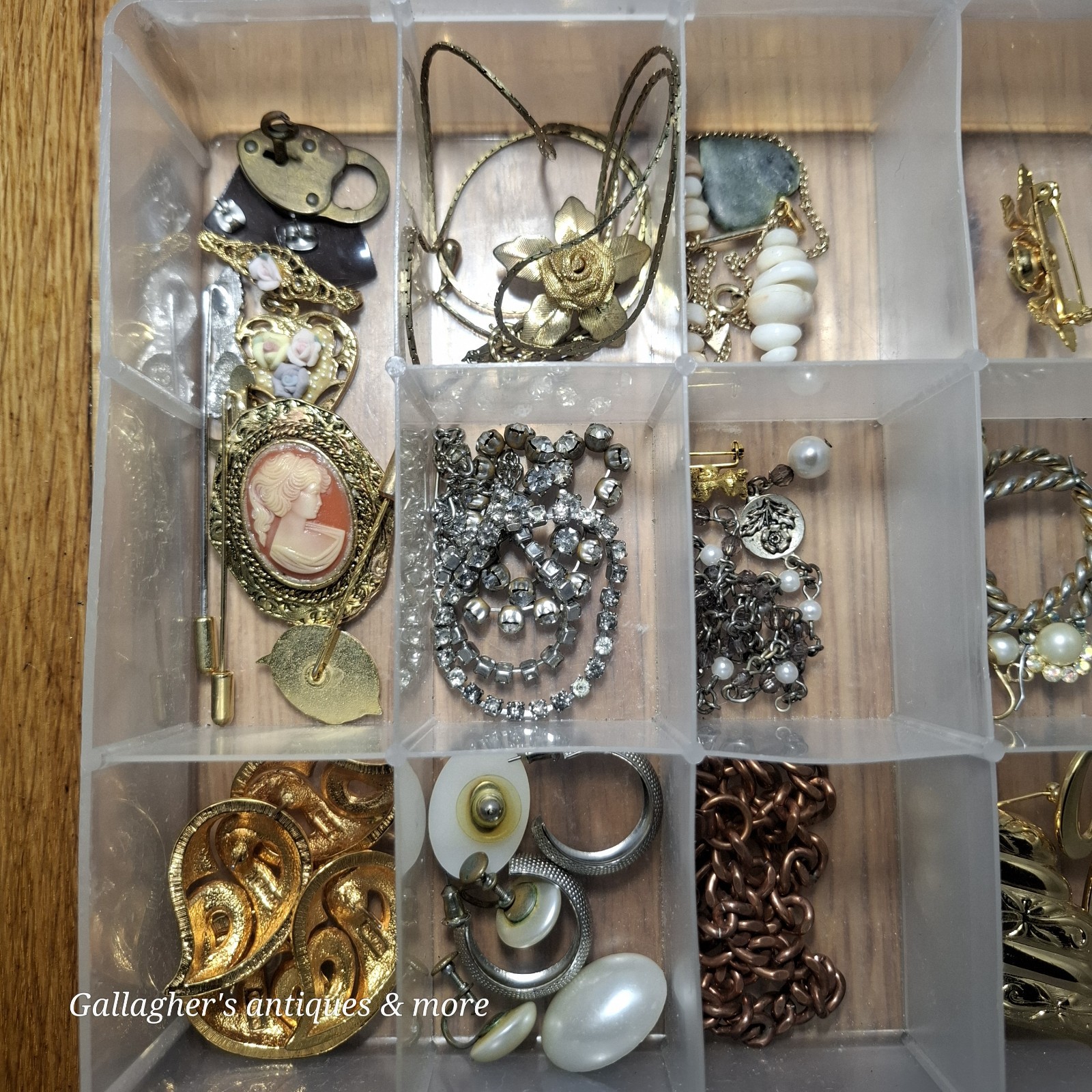 Vintage jewelry lot Broaches earrings charms bracelets Necklace Pins And more