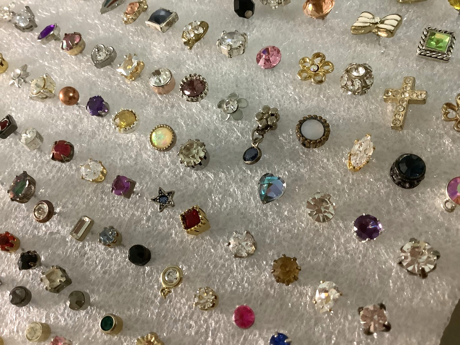 Huge lot of mixed vintage SINGLE stud earrings various unknown stones materials