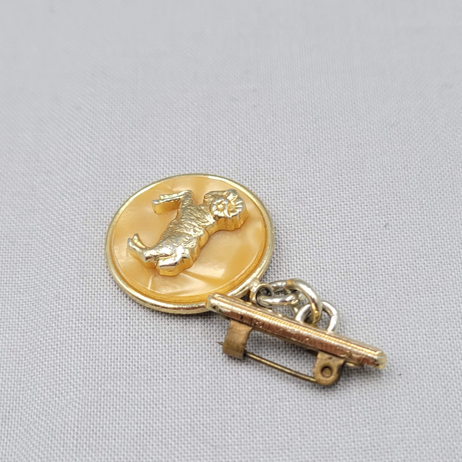 Vintage Aries Pearlized Brooch Gold tone 1 5/8″