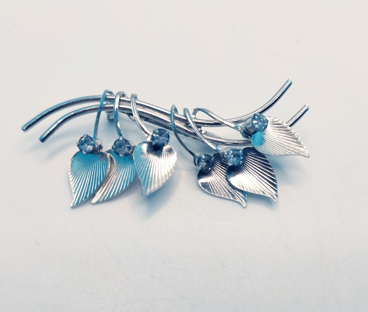 Vintage Articulated Leaves Branch Light Blue Rhinestone Silver Tone Brooch Pin