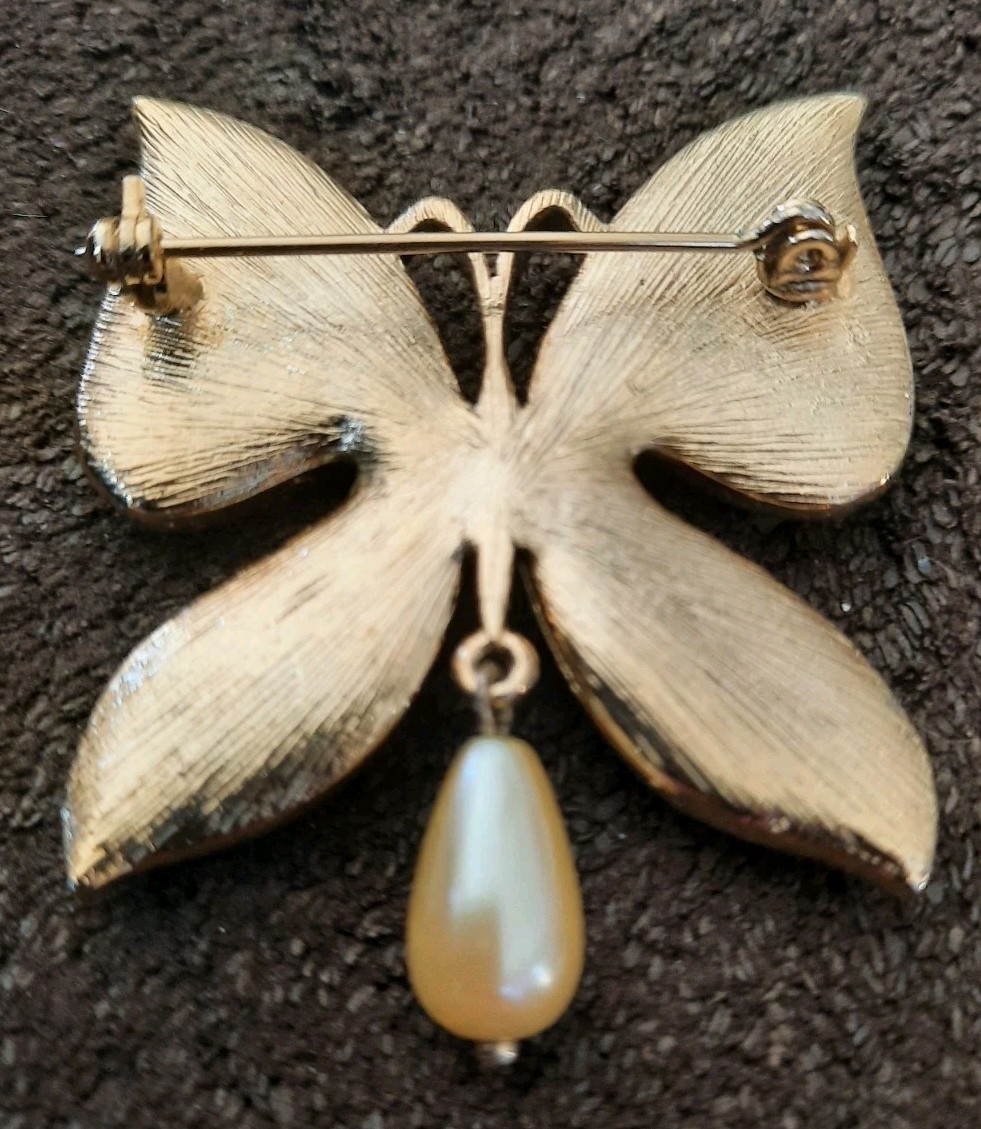 green butterfly brooch