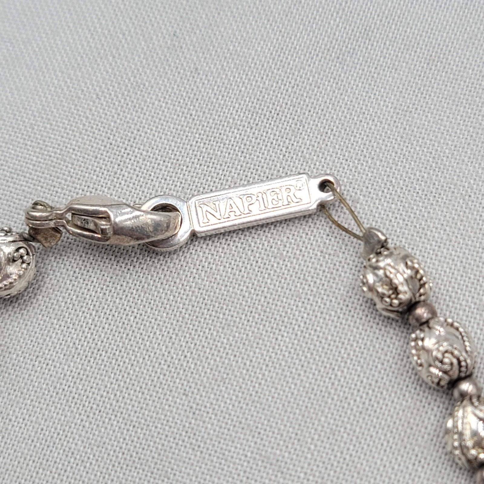 Vintage Napier Embossed Silver tone Bead Bracelet 6.75″