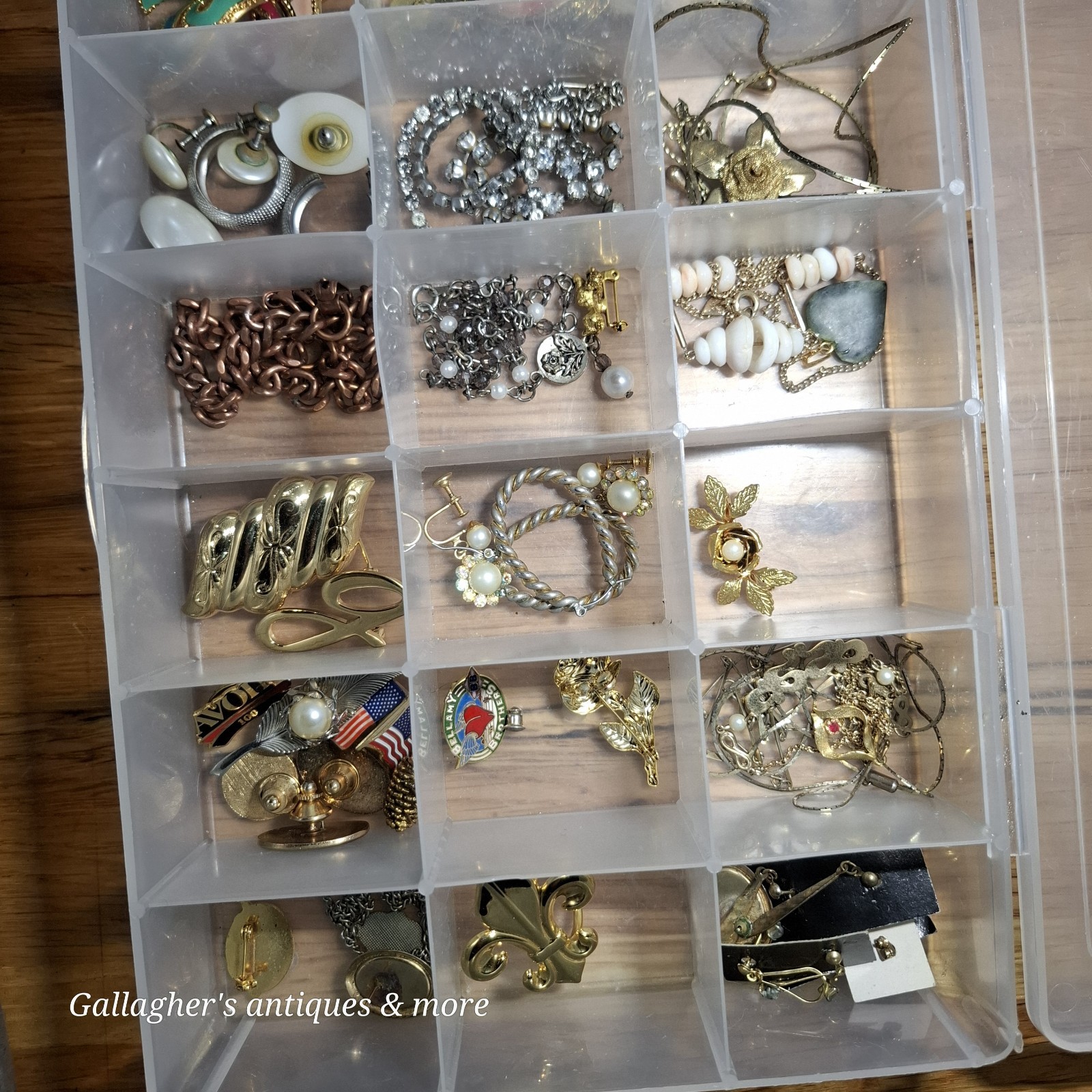 Vintage jewelry lot Broaches earrings charms bracelets Necklace Pins And more