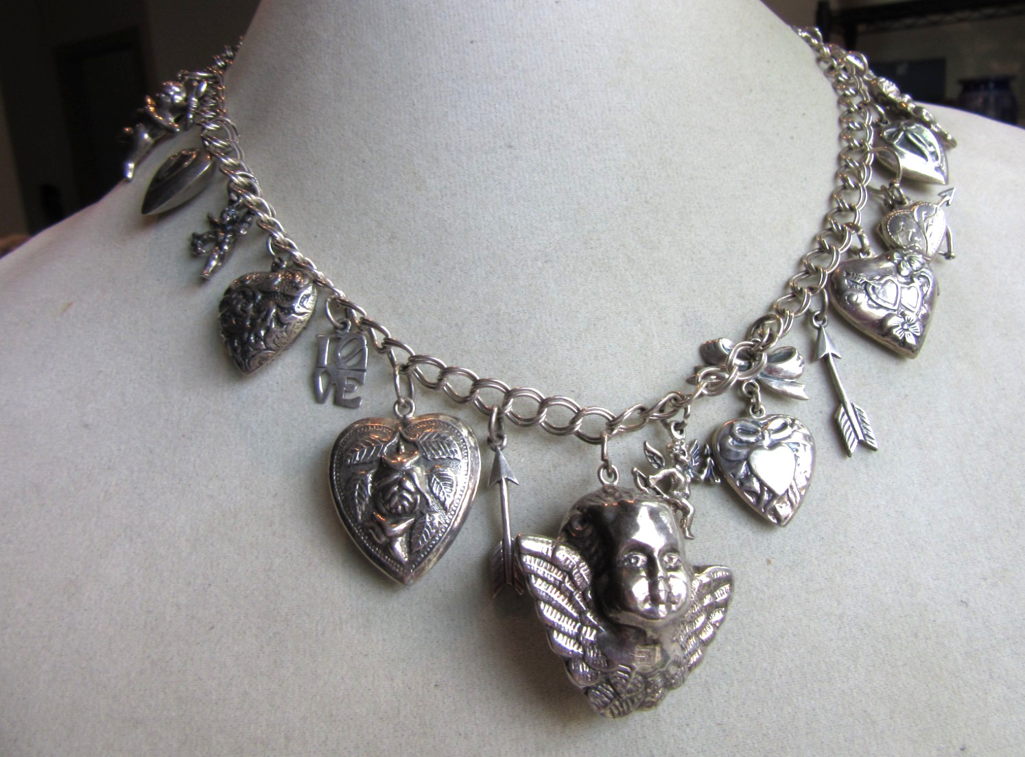 Vintage double link chain necklace with 22 heart, love themed charms 61.8 grams