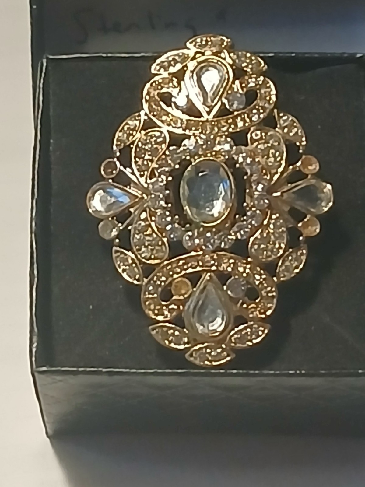 Vintage Rhinestone Ring in gold metal setting with adjustable band -1 size 4 all