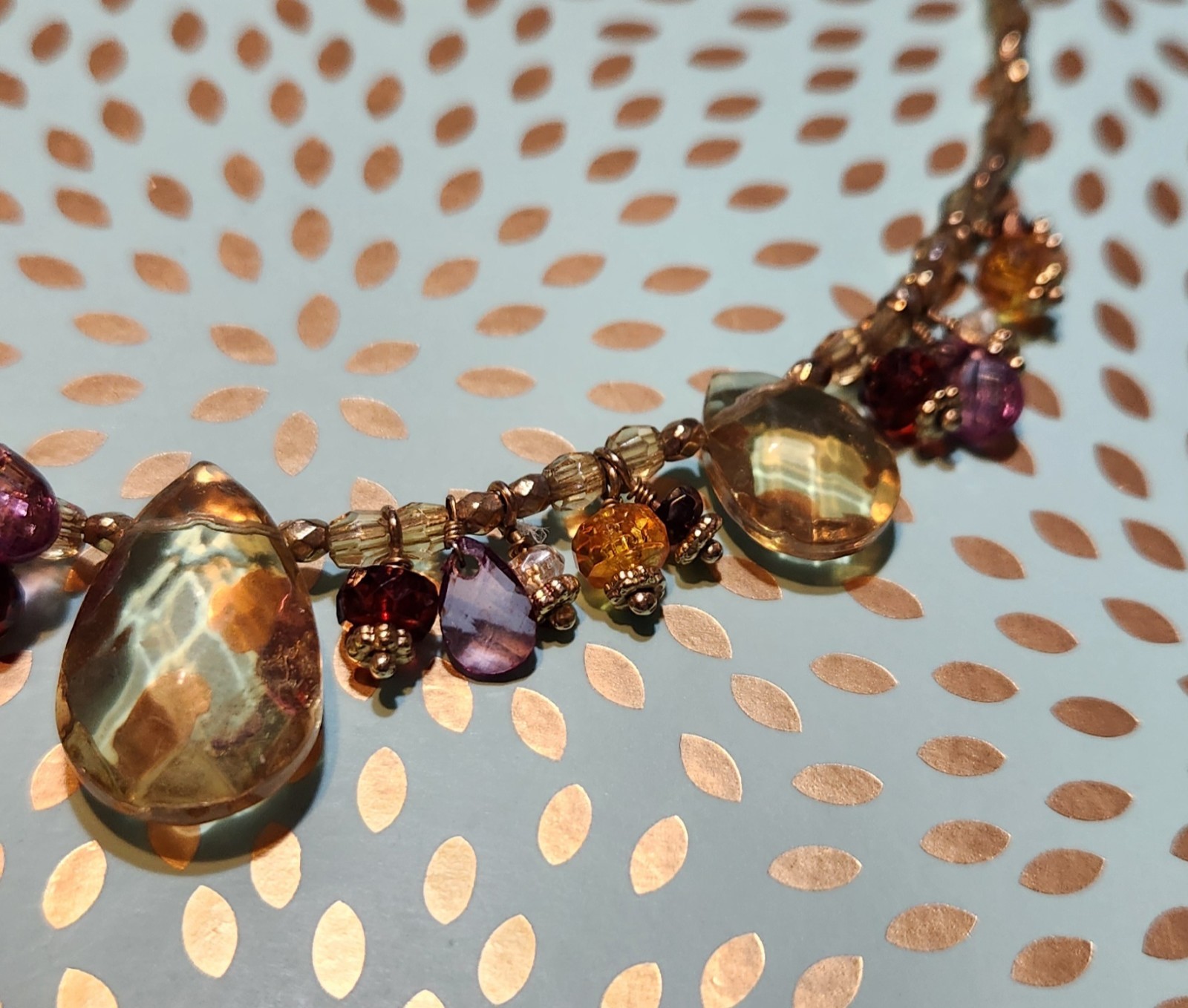 Vtg Cookie Lee faceted Purples/Yellows Lucite Charm Necklace on pale Gold chain