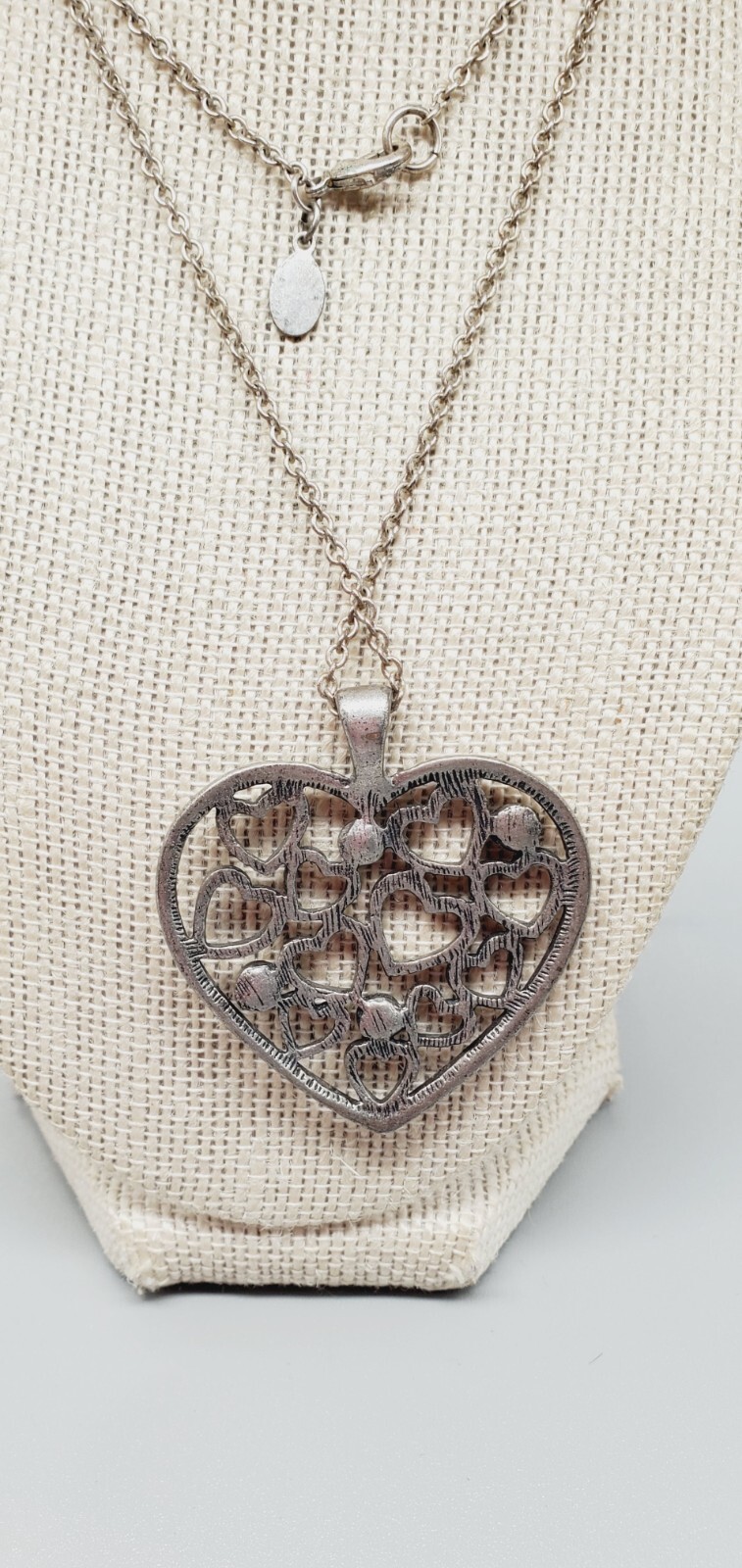 American Eagle Silvertone 1.75″ multiple hearts within pendant necklace 32″ te01