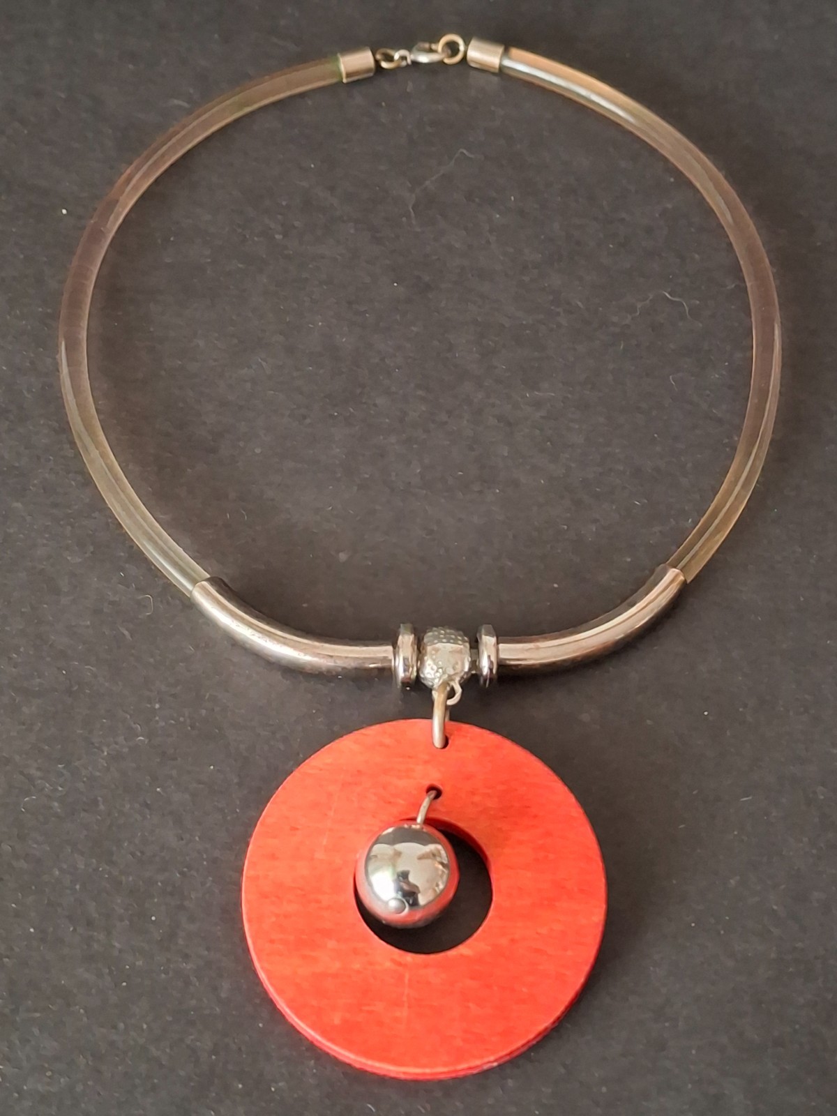Aarikka Finland necklace with a vibrant red wooden ring pendant