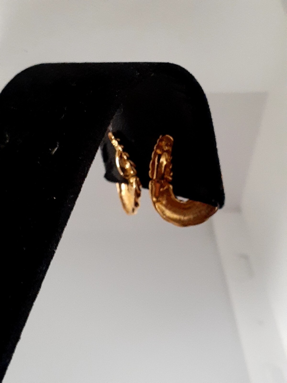 Lancer Gold tone ribbed hoop Huggie Clip on Earrings