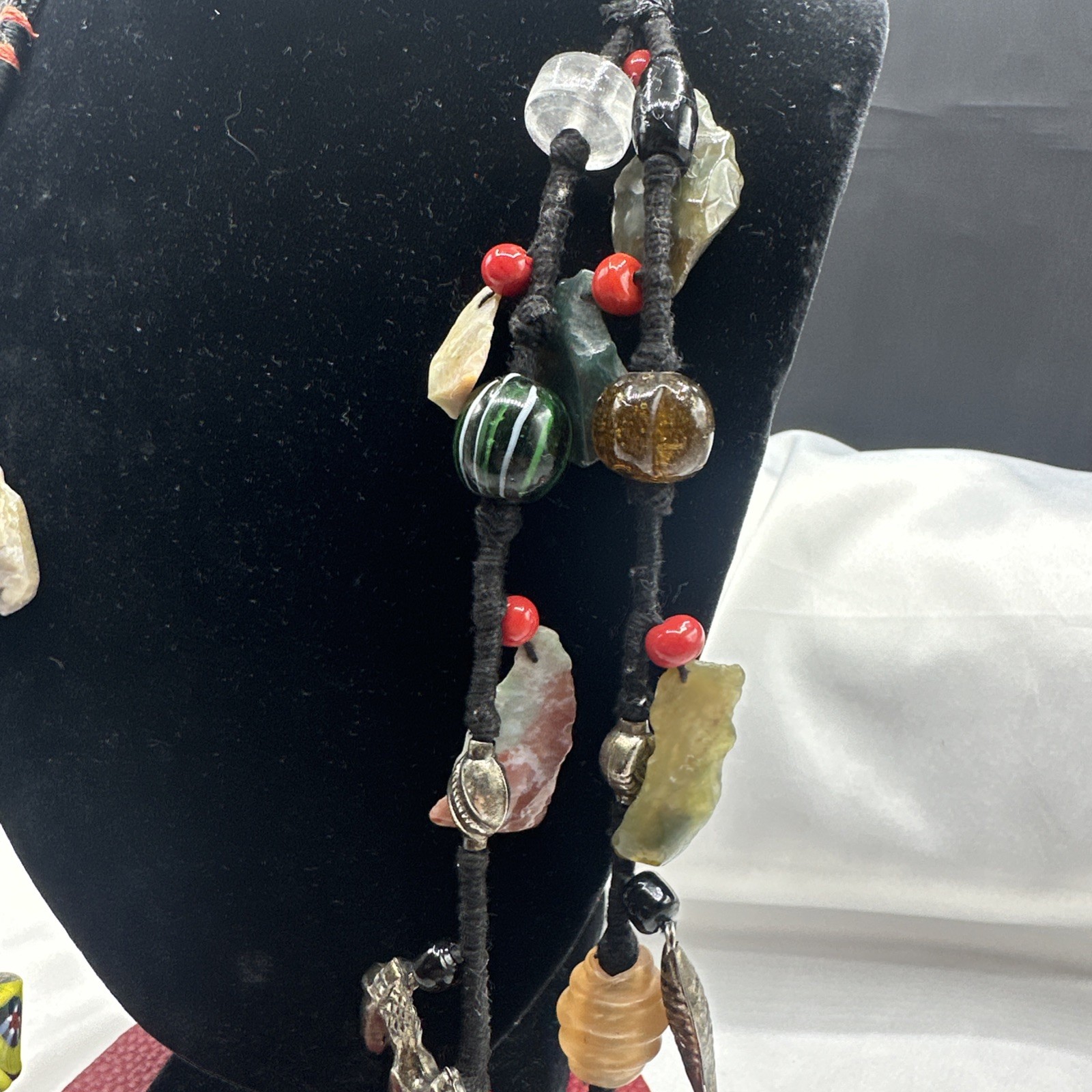 Vtg Indian Glass Beads Stone Nuggets and Seven Puffed Animals Cord Necklace.Read