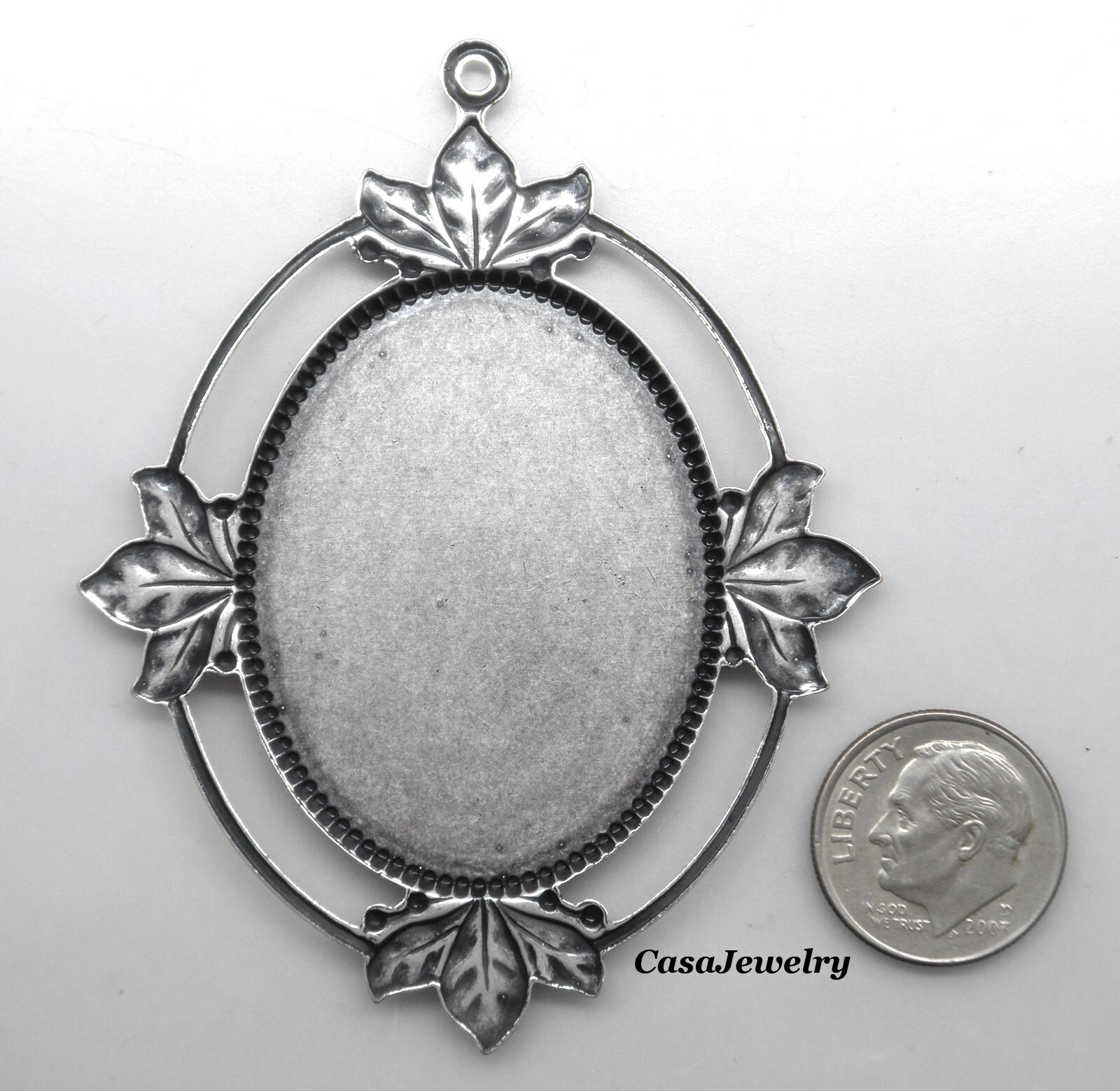#1820 ANTIQUED STERLING SILVER PLATED 40×30 LEAF BORDER BEZEL W/TOP RING – 1 Pc