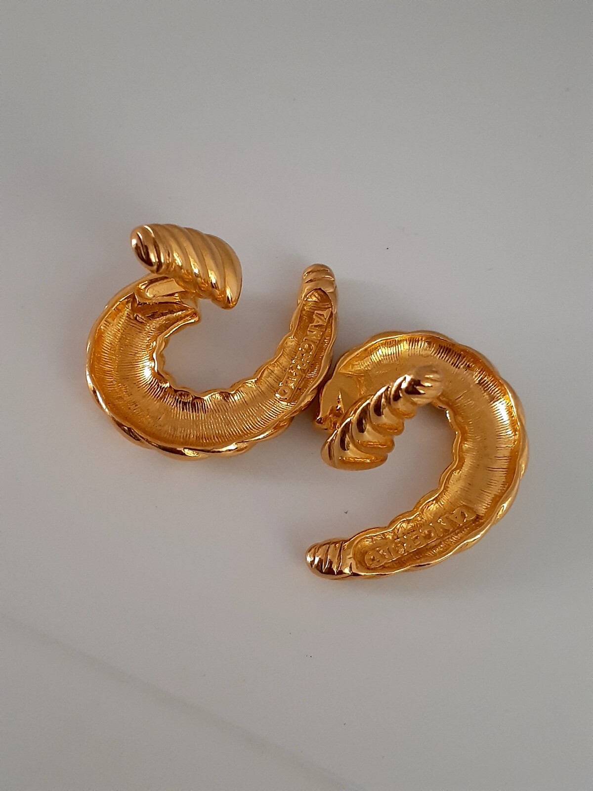 Lancer Gold tone ribbed hoop Huggie Clip on Earrings