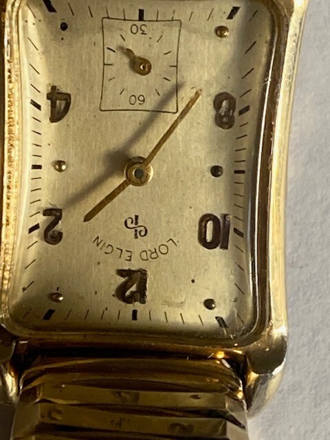 Lord Elgin 1955 14k Yellow Gold Filled Rectangular Curved Watch.run