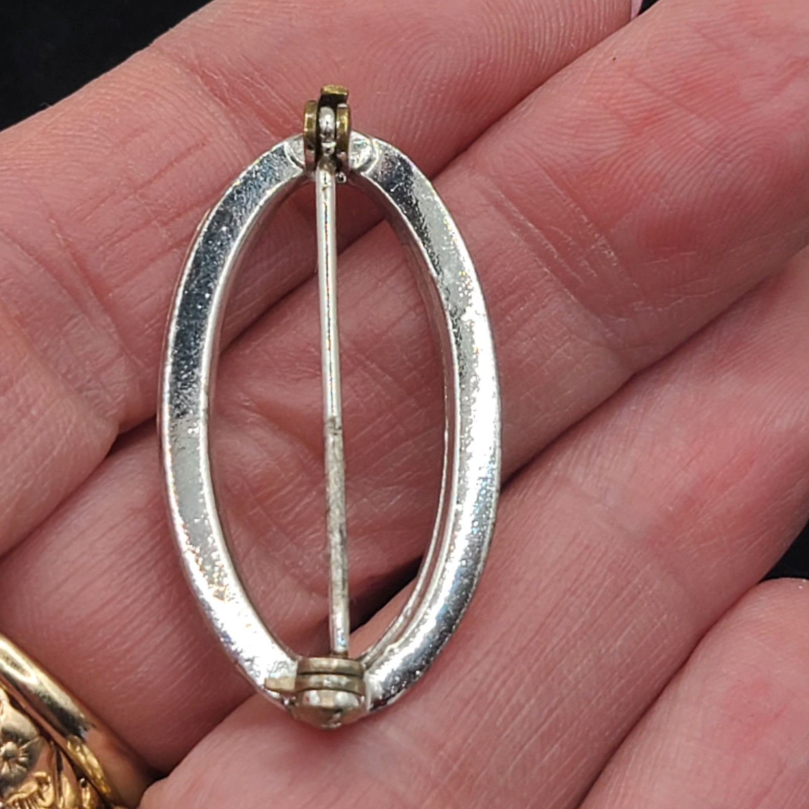 Brooch silvertone oval with AB stones. Vintage