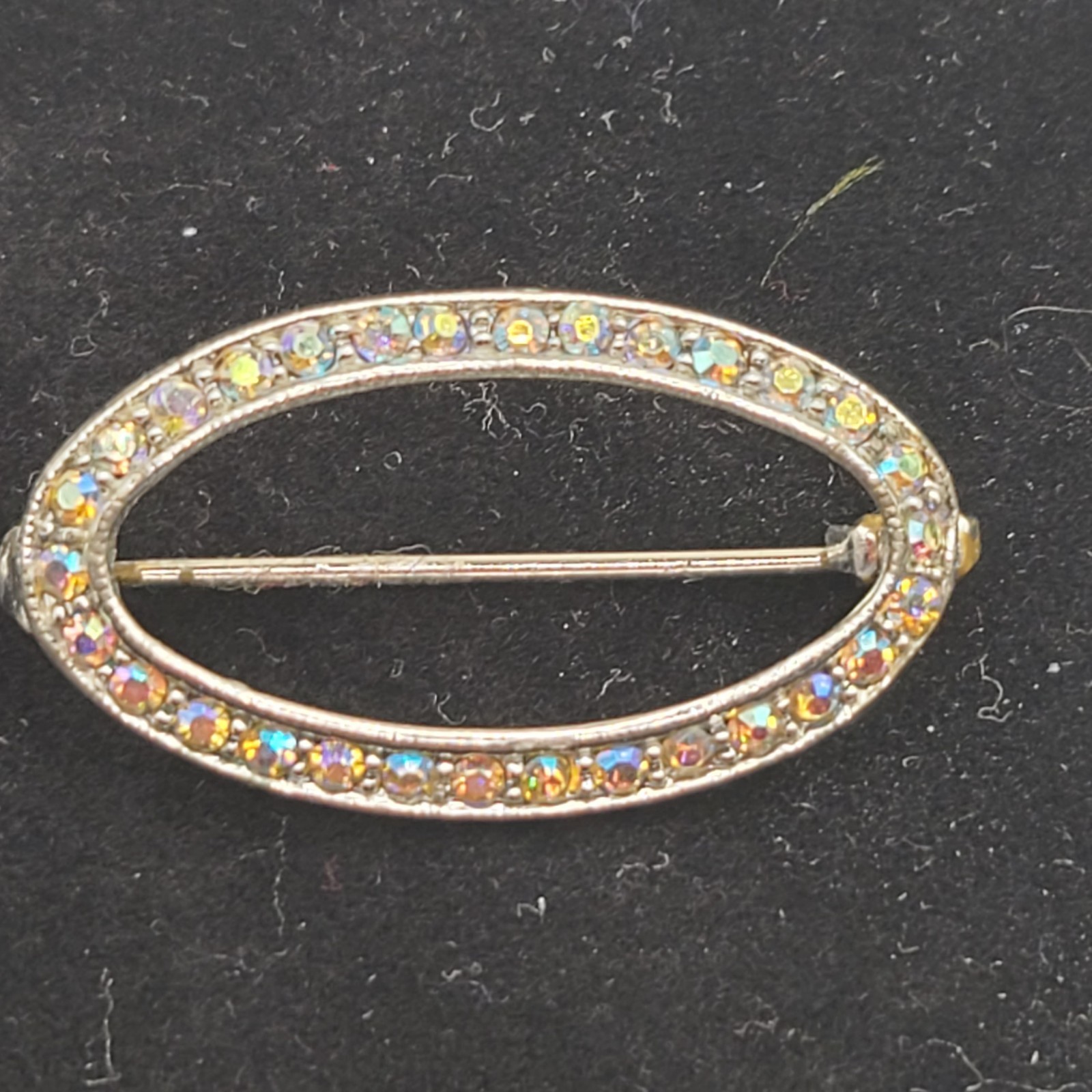 Brooch silvertone oval with AB stones. Vintage