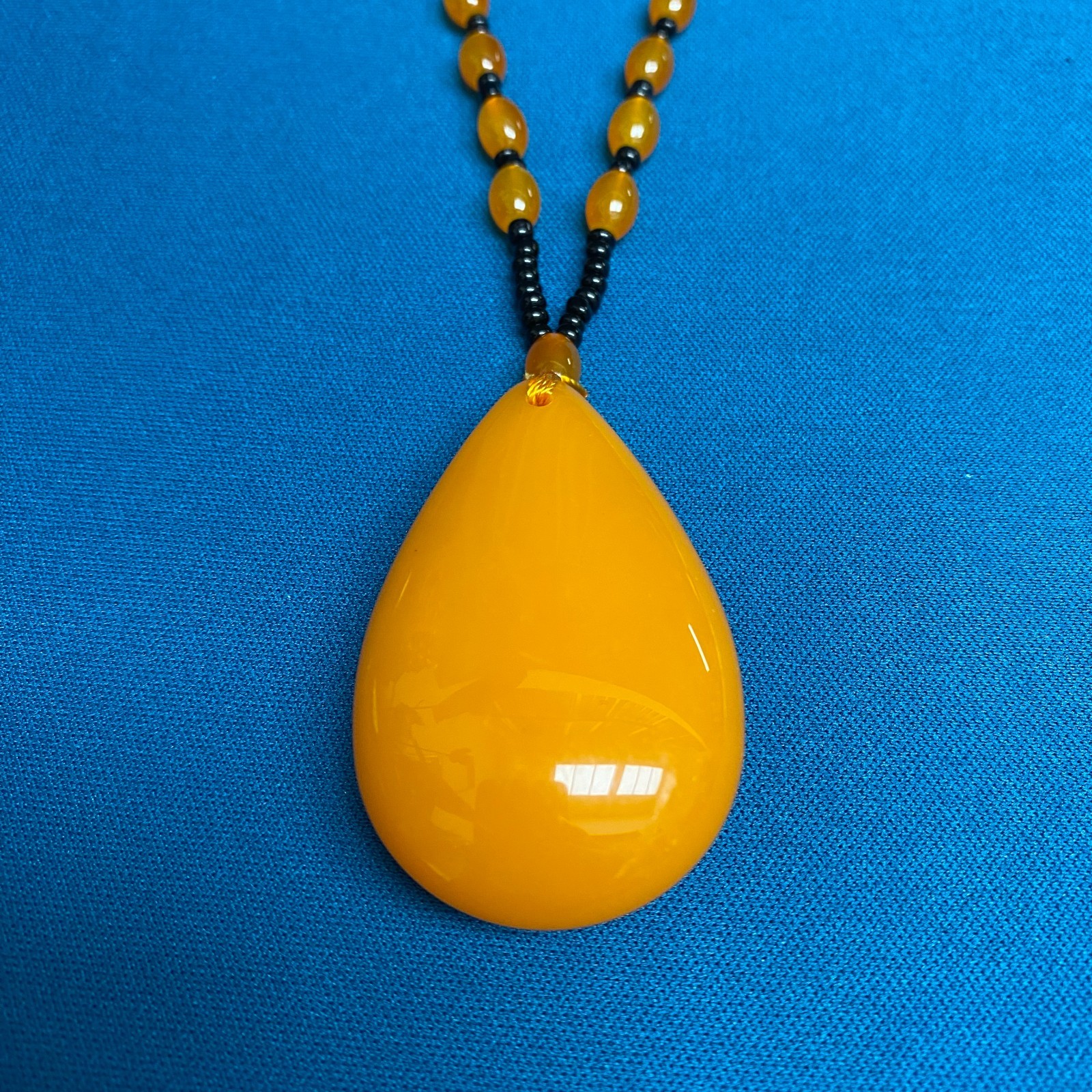 Oversized Amber-Tone Teardrop Pendant with Beaded Necklace