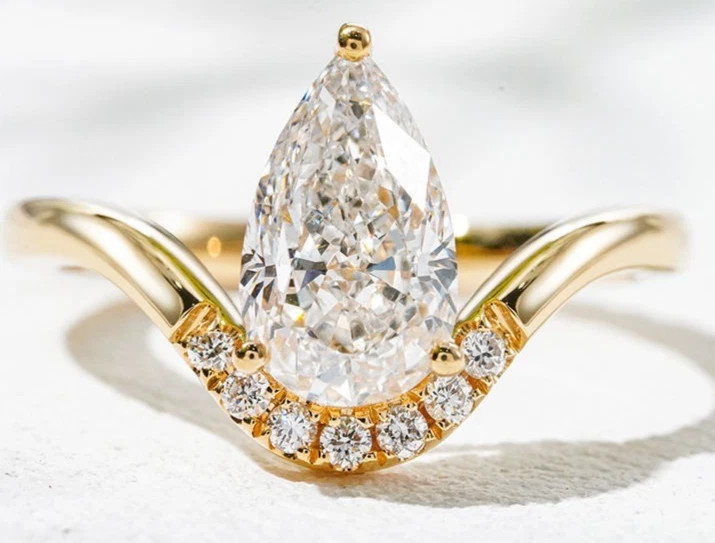 Pear & Round Cut 1.36TCW White Moissanite Wave Pattern Ring In 10K Yellow GoldFN