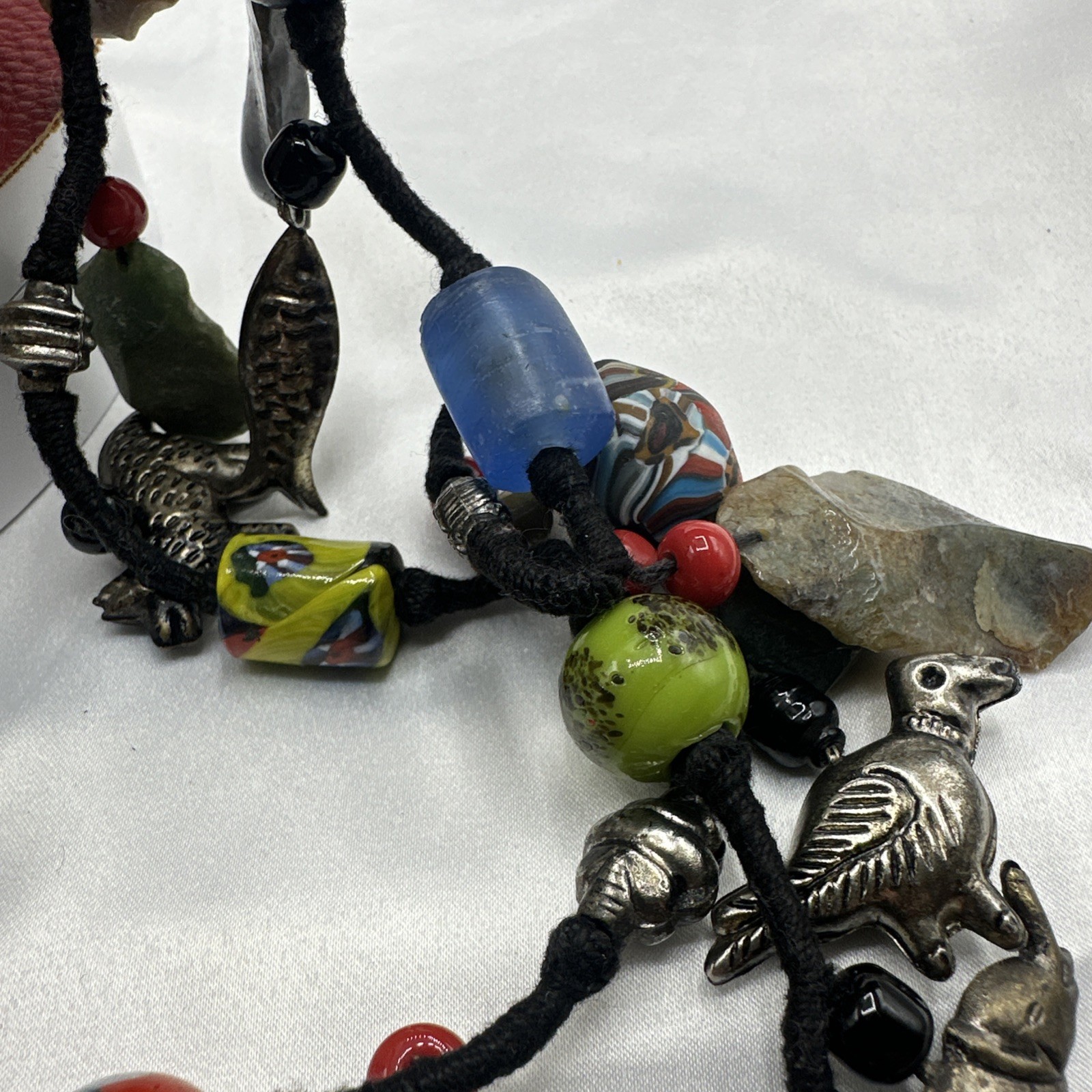 Vtg Indian Glass Beads Stone Nuggets and Seven Puffed Animals Cord Necklace.Read