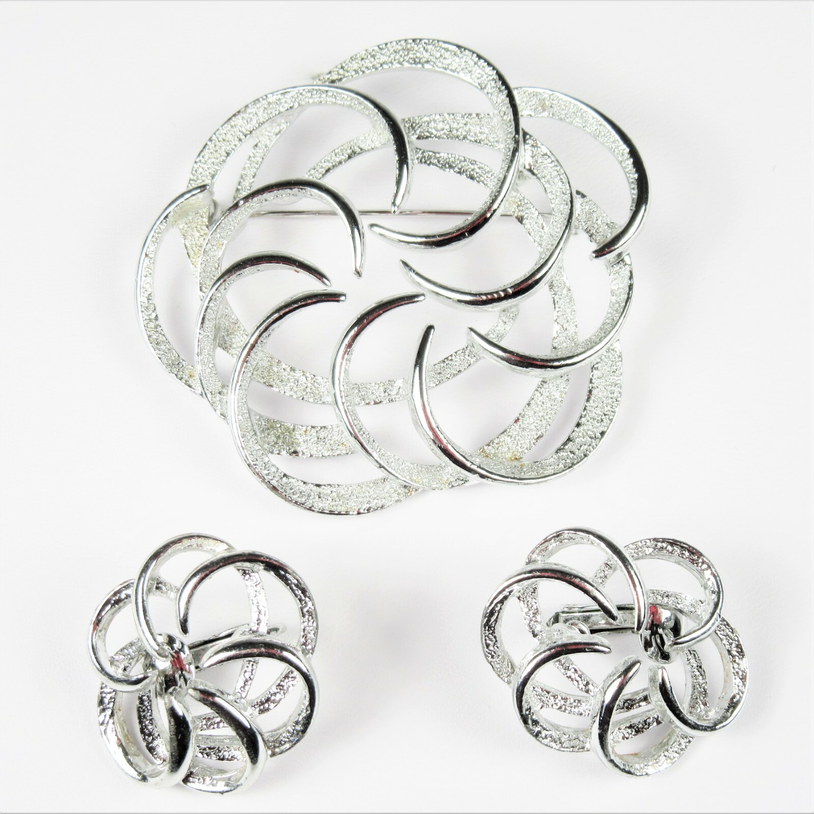 Sarah Coventry Silvertone Tailored Swirl Pin and Clip On Earrings Set Signed