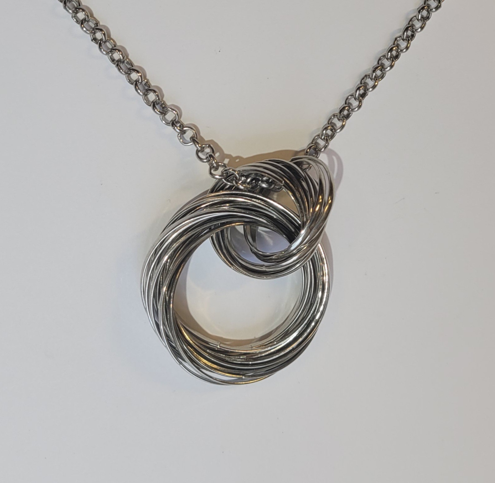Mid Century Modern Intertwined Multi Ring Stainless Steel Pendant 36in Necklace