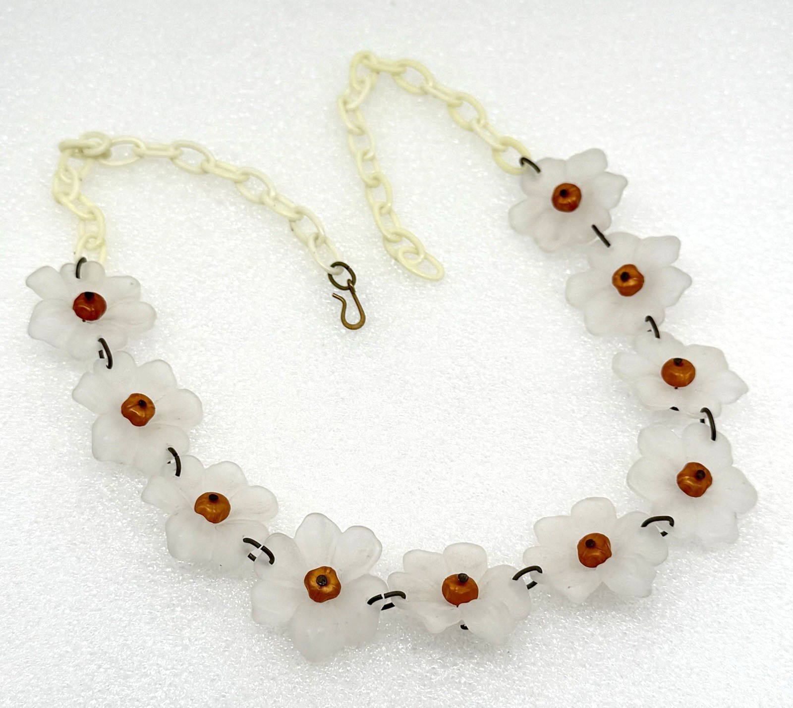 Vintage Lucite or acrylic whitish flowers with orange centers necklace
