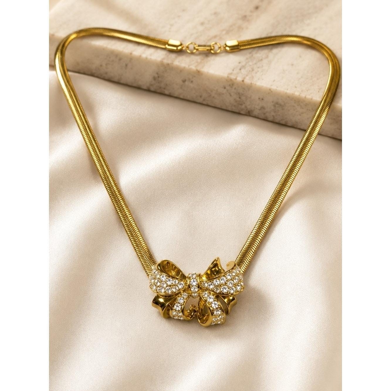 Vintage Nolan Miller Rhinestone Bow Necklace Gold Tone Snake Chain Statement