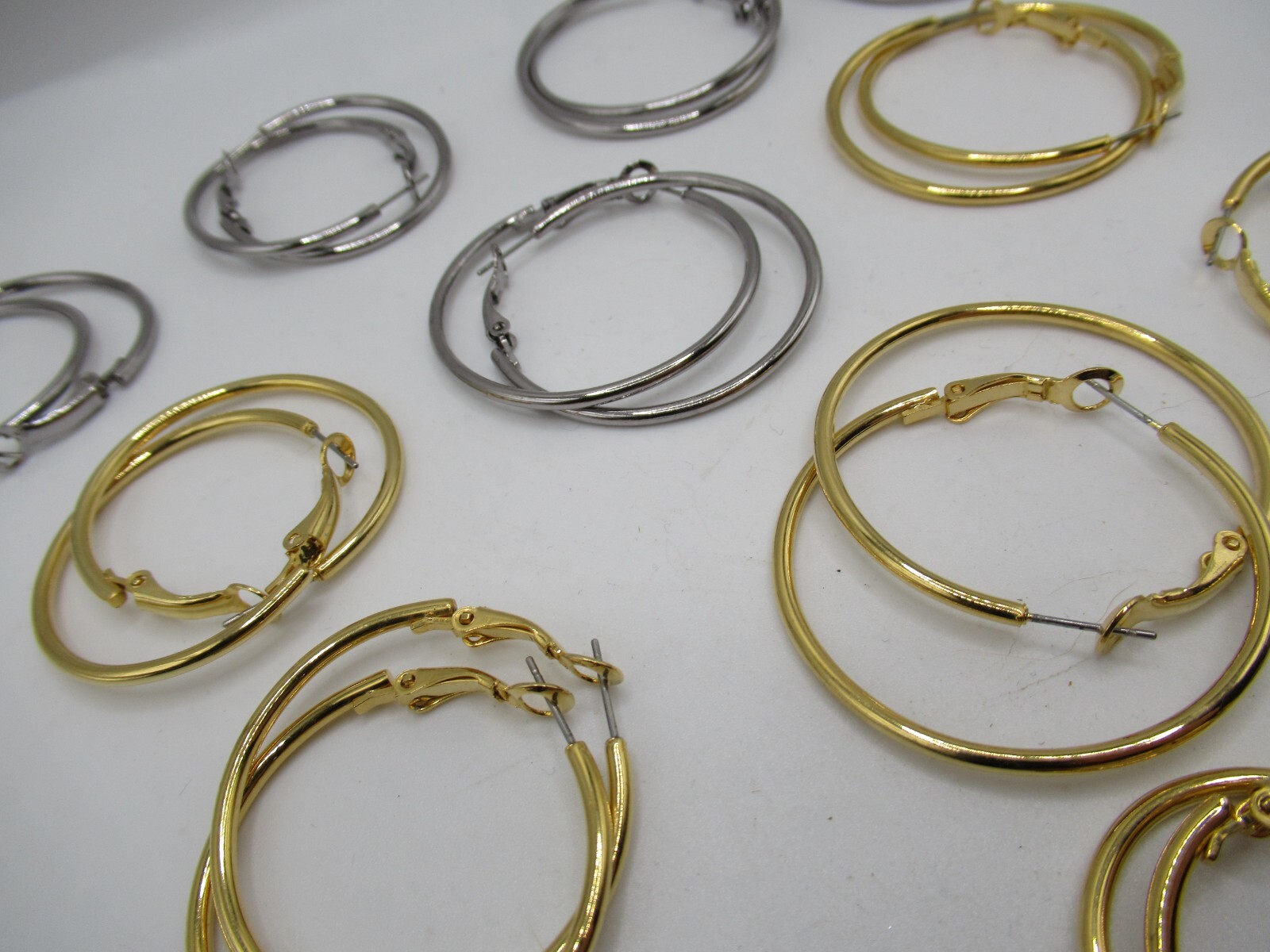 Vintage lot 12 pairs silver and gold plain hoop pierced earrings assorted sizes