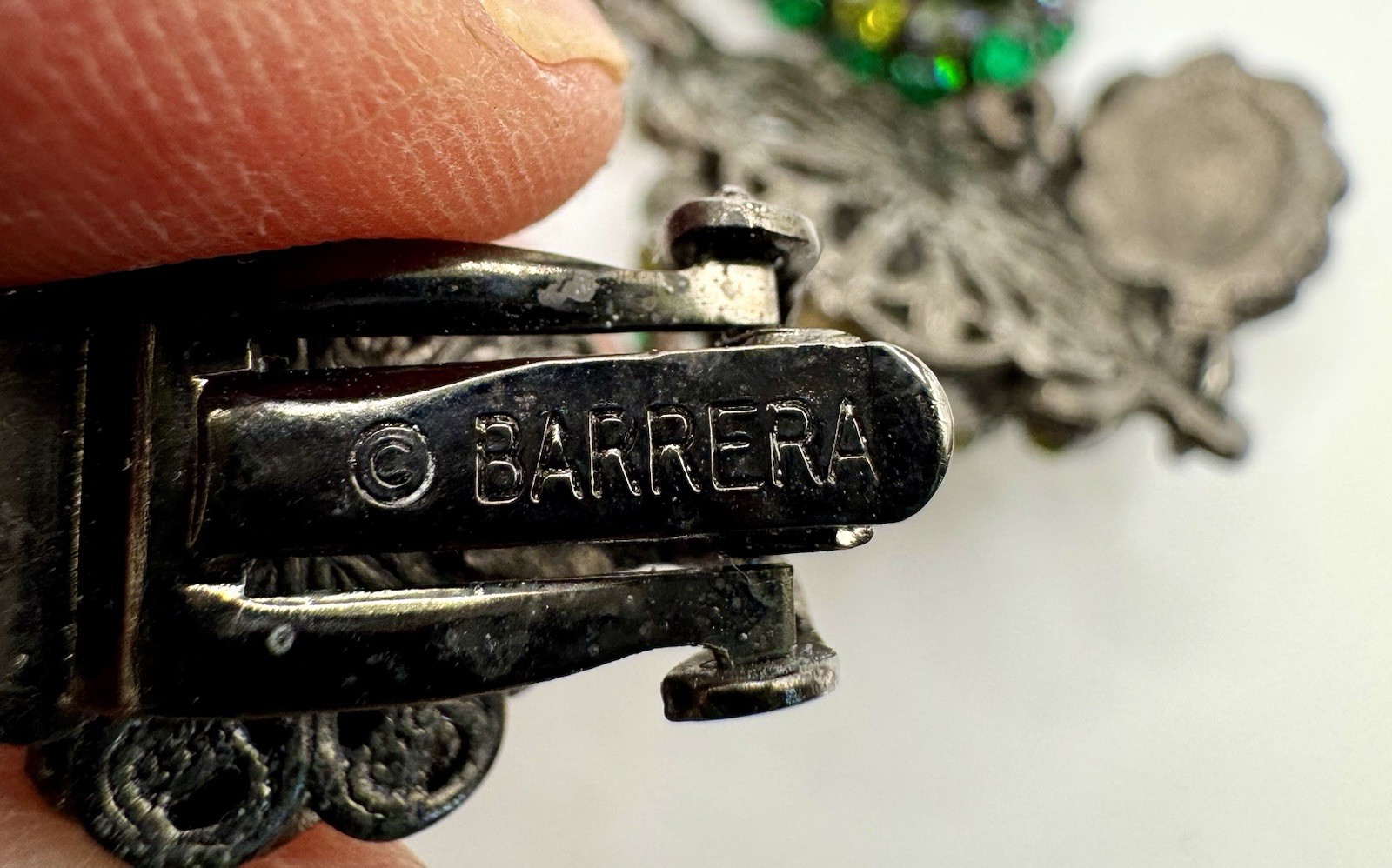 Barrera Crystal Clip-On Drop Earrings Of vibrant green crystals set in Gunmetal