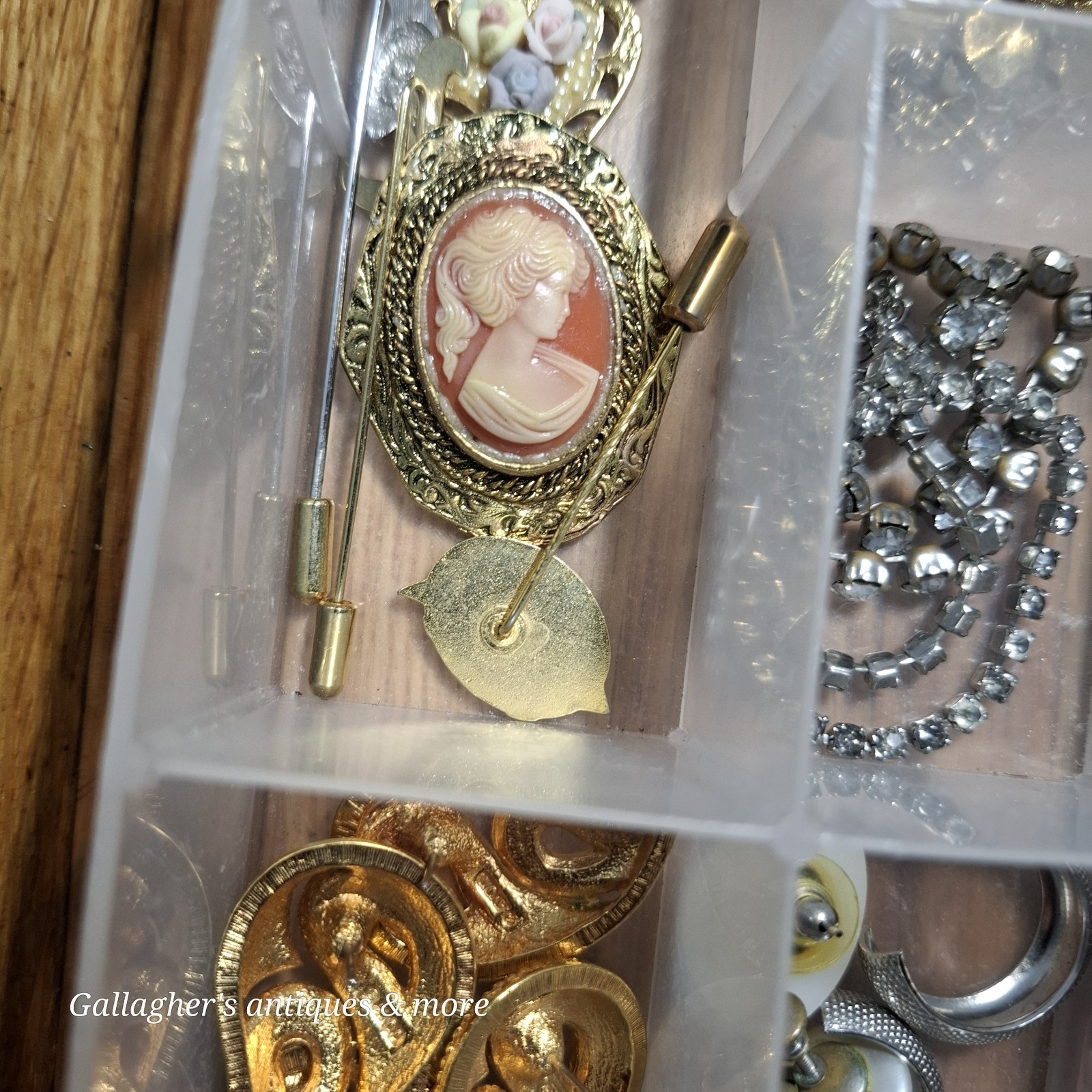 Vintage jewelry lot Broaches earrings charms bracelets Necklace Pins And more