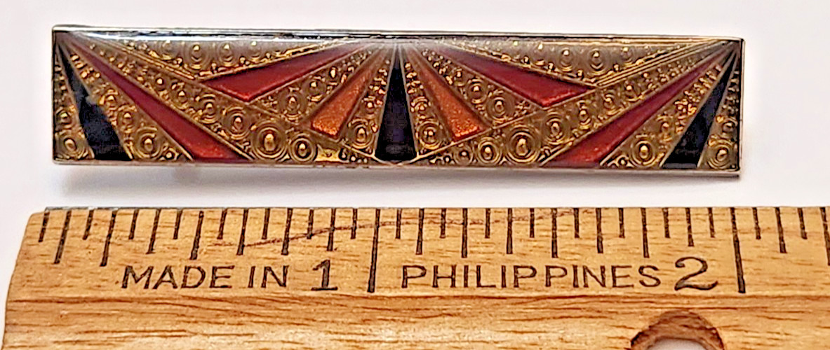 small enamel color pin 2″ x 7/8″ gold, yellow,black, red