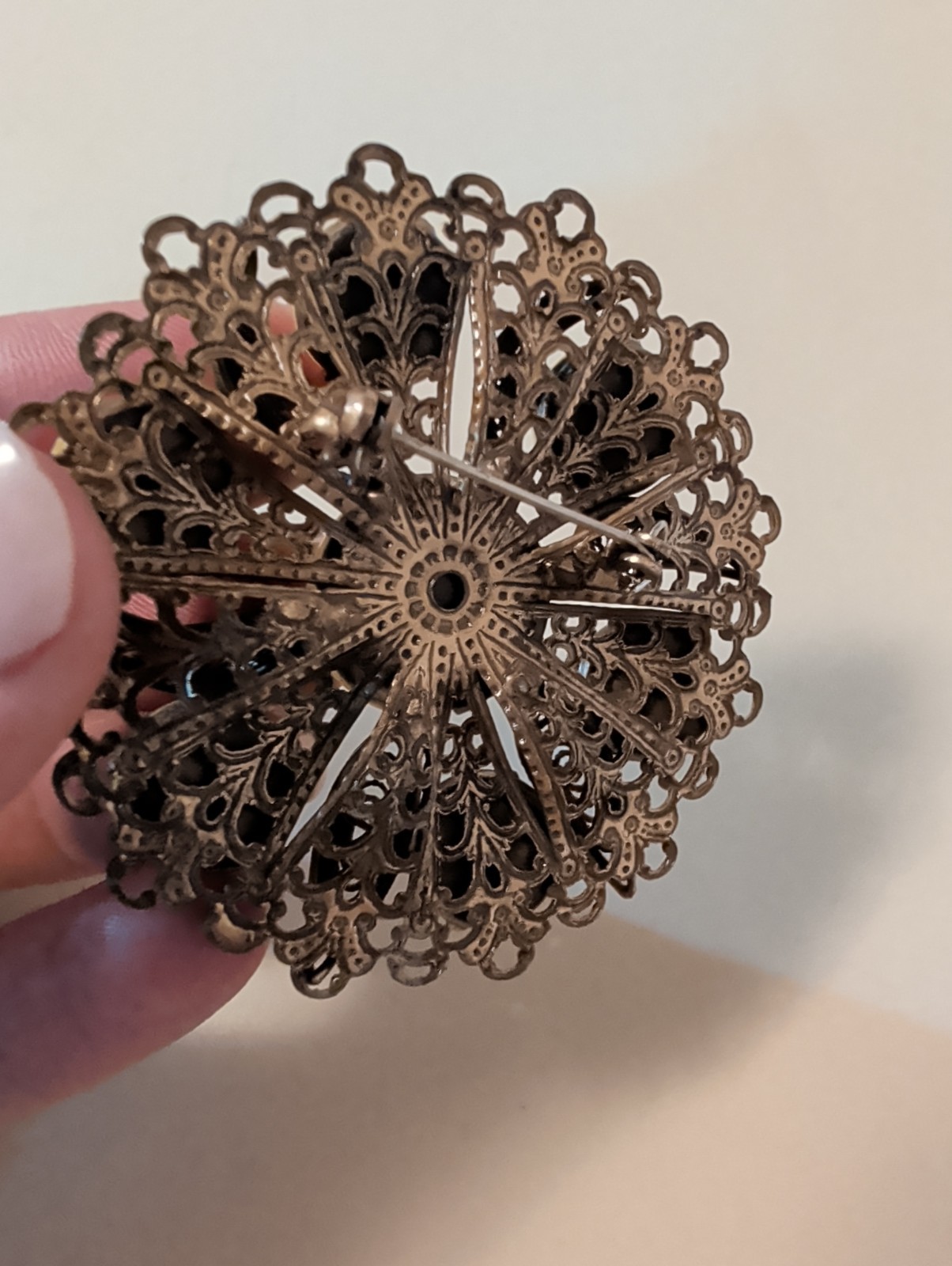 Vintage filigree Bronze Tone Brooch. UV Reactive. 2.5″