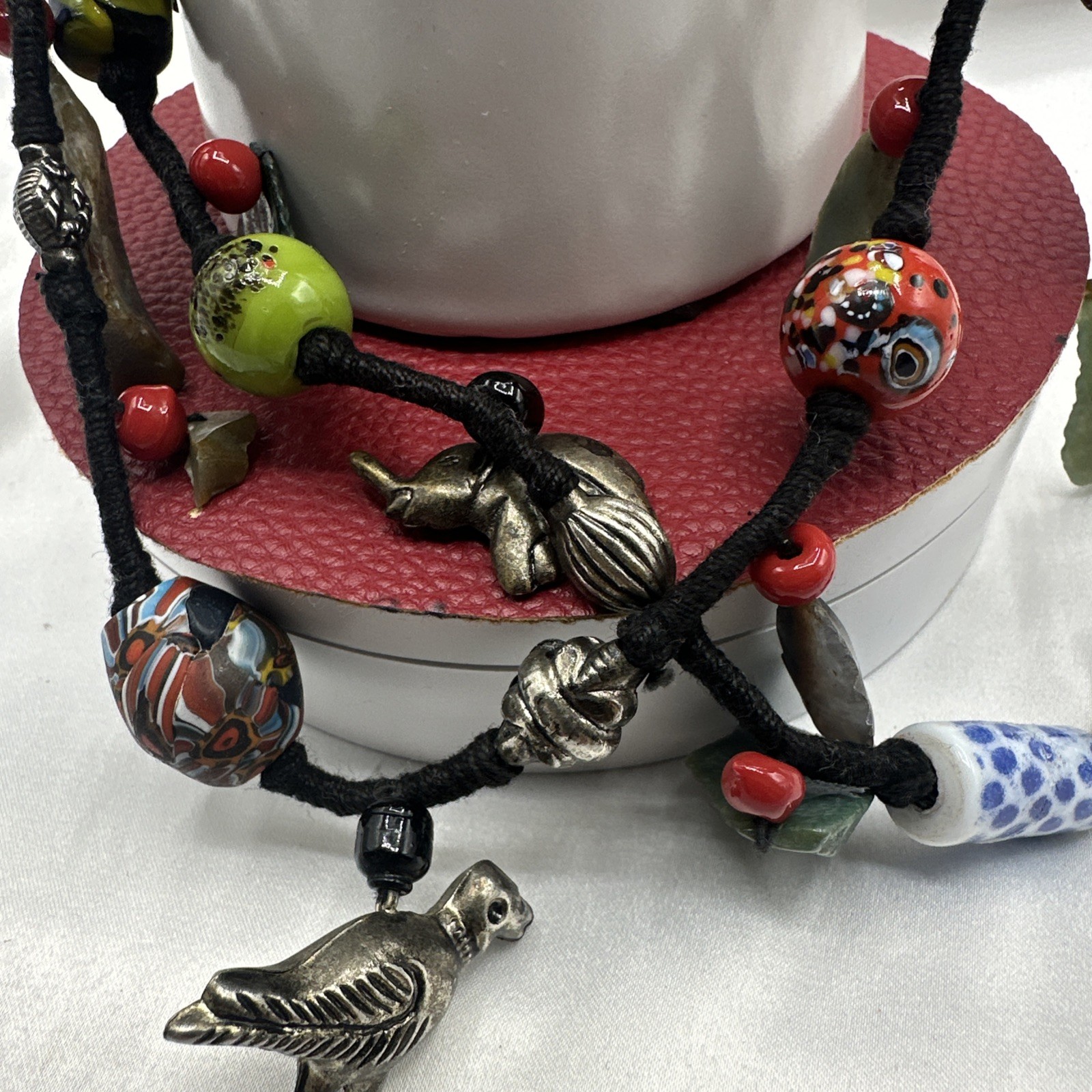 Vtg Indian Glass Beads Stone Nuggets and Seven Puffed Animals Cord Necklace.Read