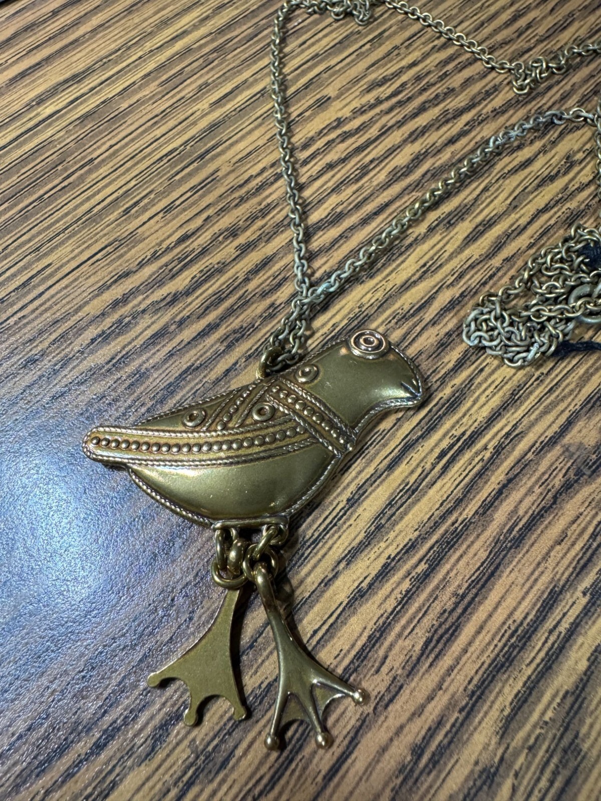 Kalevala Koru 32″ Bronze Color Bird Necklace With Dangling Legs